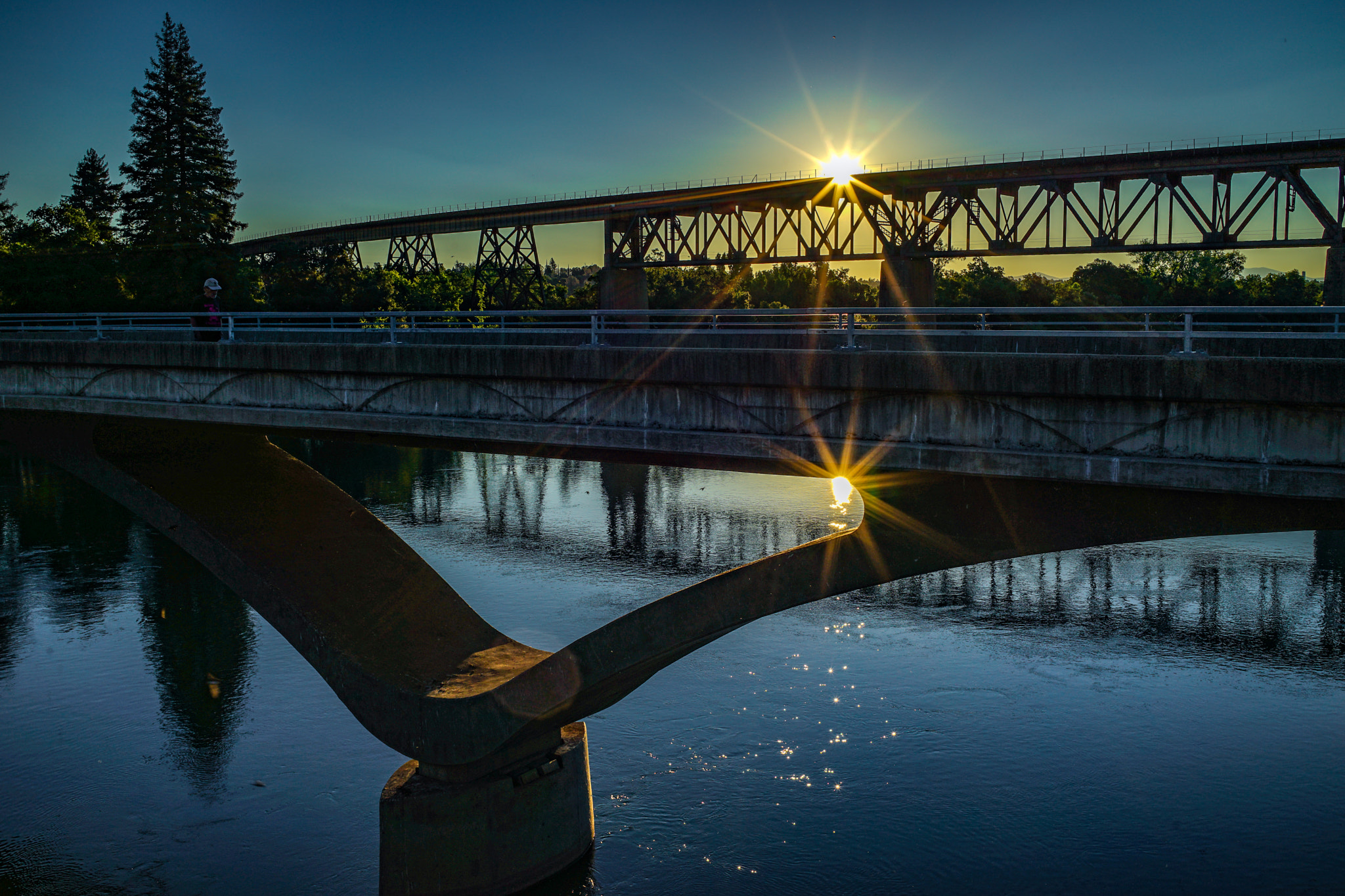 E 35mm F2 sample photo. Sun rising over the railroad tracks, and reflectin ... photography