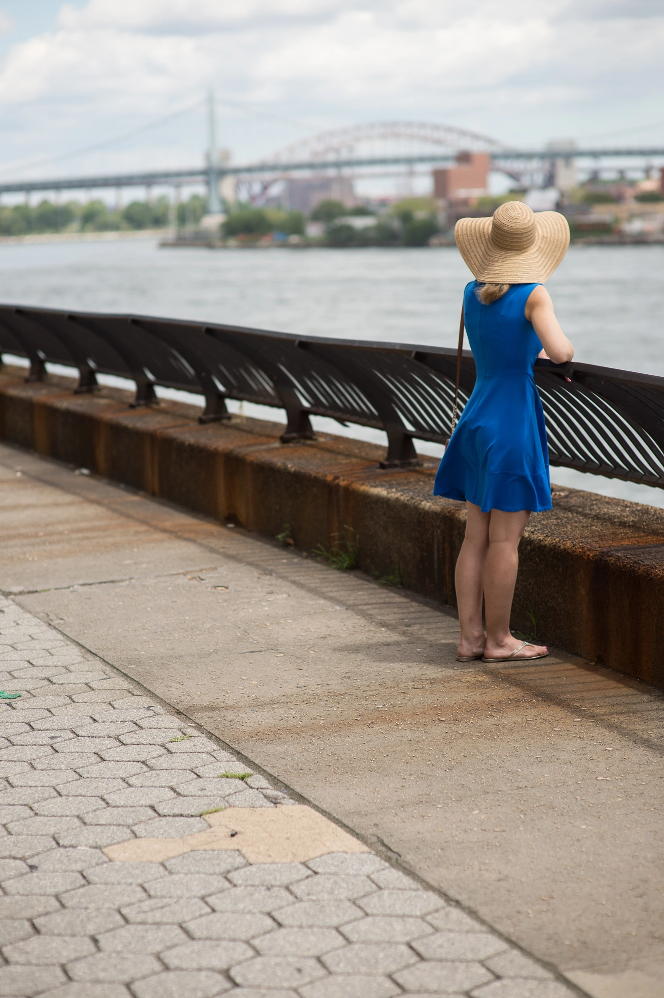 Nikon Df + Sigma 85mm F1.4 EX DG HSM sample photo. East river woman in hat photography