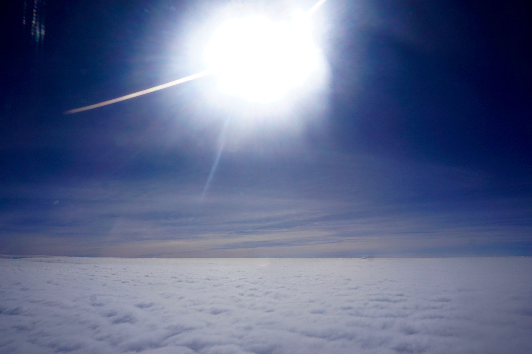 Tamron 18-200mm F3.5-6.3 Di III VC sample photo. Midflightclouds.jpg photography