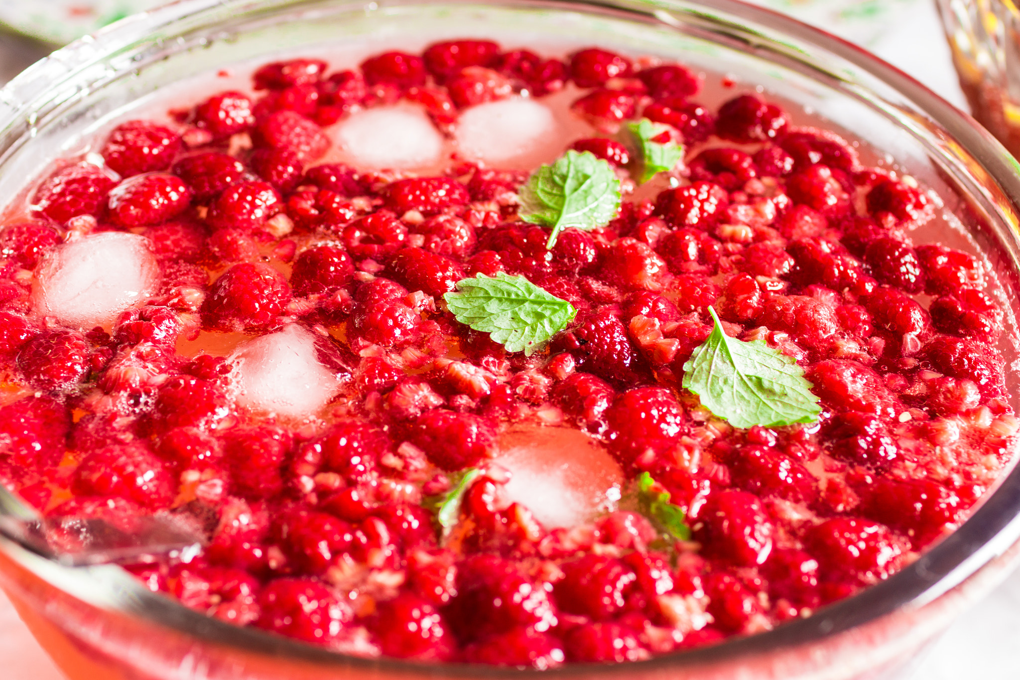 Canon EOS 70D + Canon EF 35mm F1.4L USM sample photo. Punch bowl with raspberries photography