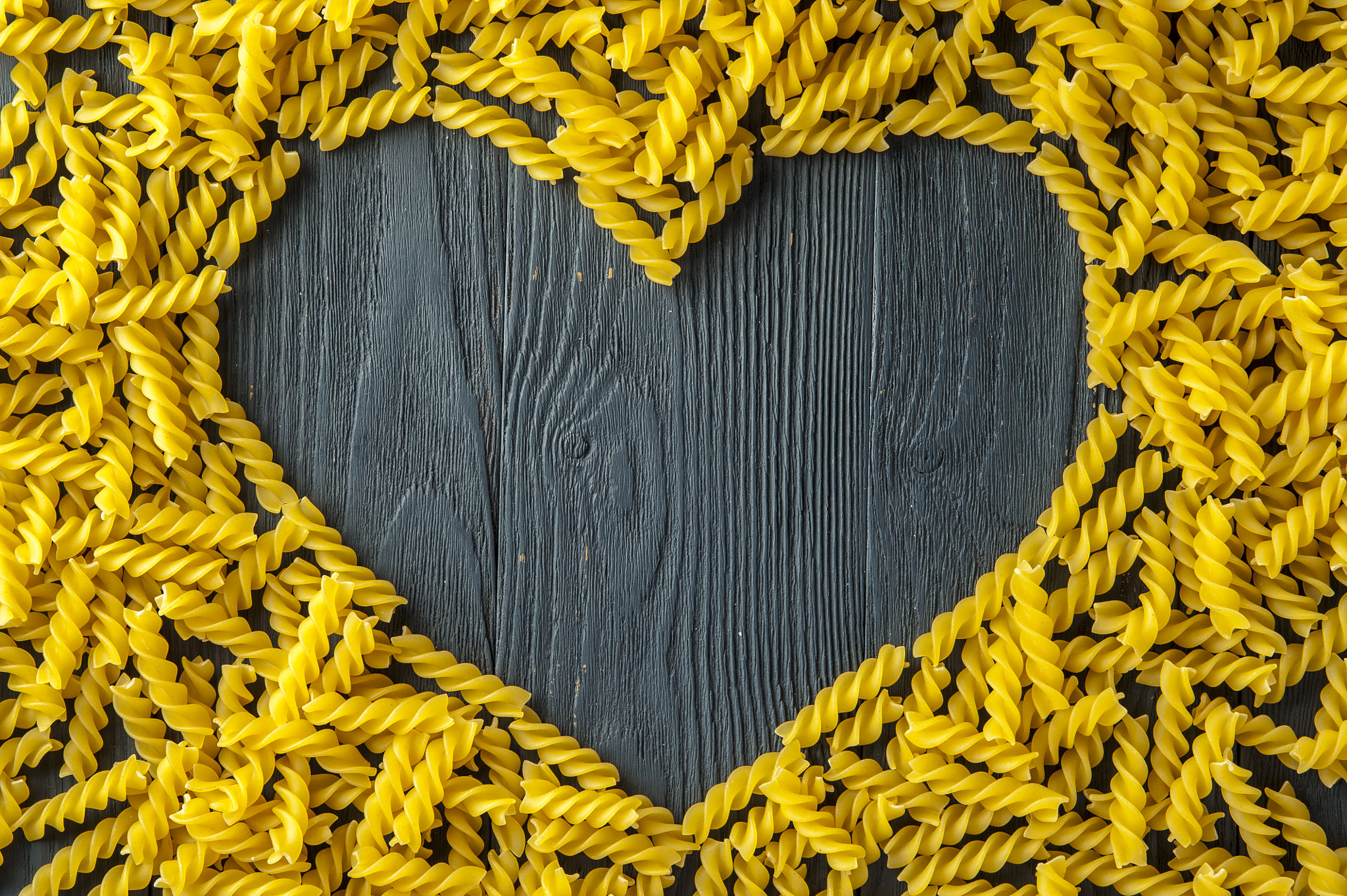 Nikon D700 + AF Micro-Nikkor 105mm f/2.8 sample photo. Heart shape made of fusilli. italian cuisine. photography