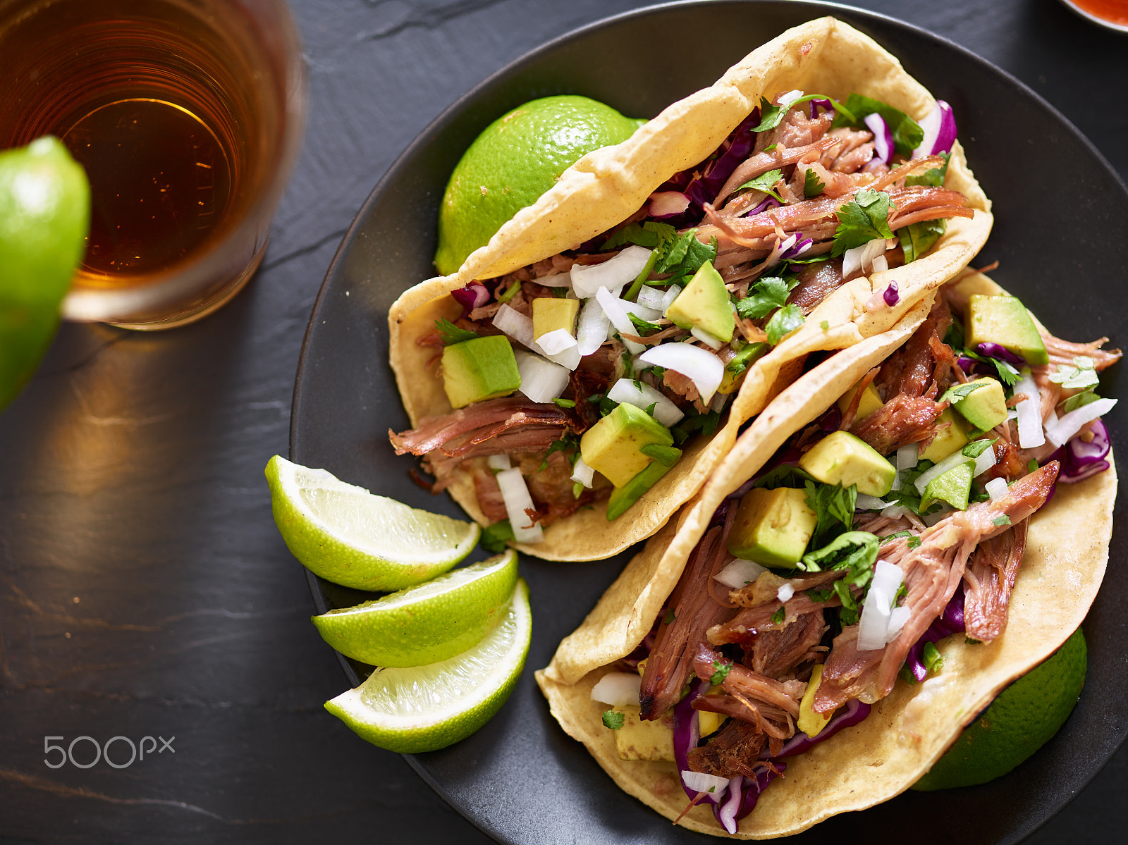 Phase One P65+ sample photo. Tasty pork street tacos with onion, cilantro, avocado, and red cabbage photography