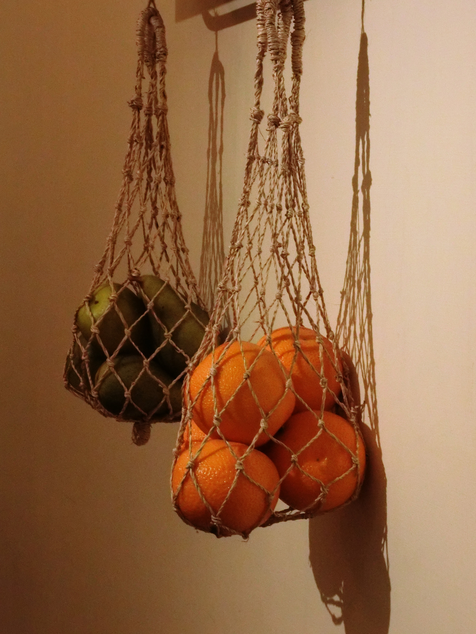 CASIO EX-10 sample photo. Fruits hung on the wall photography