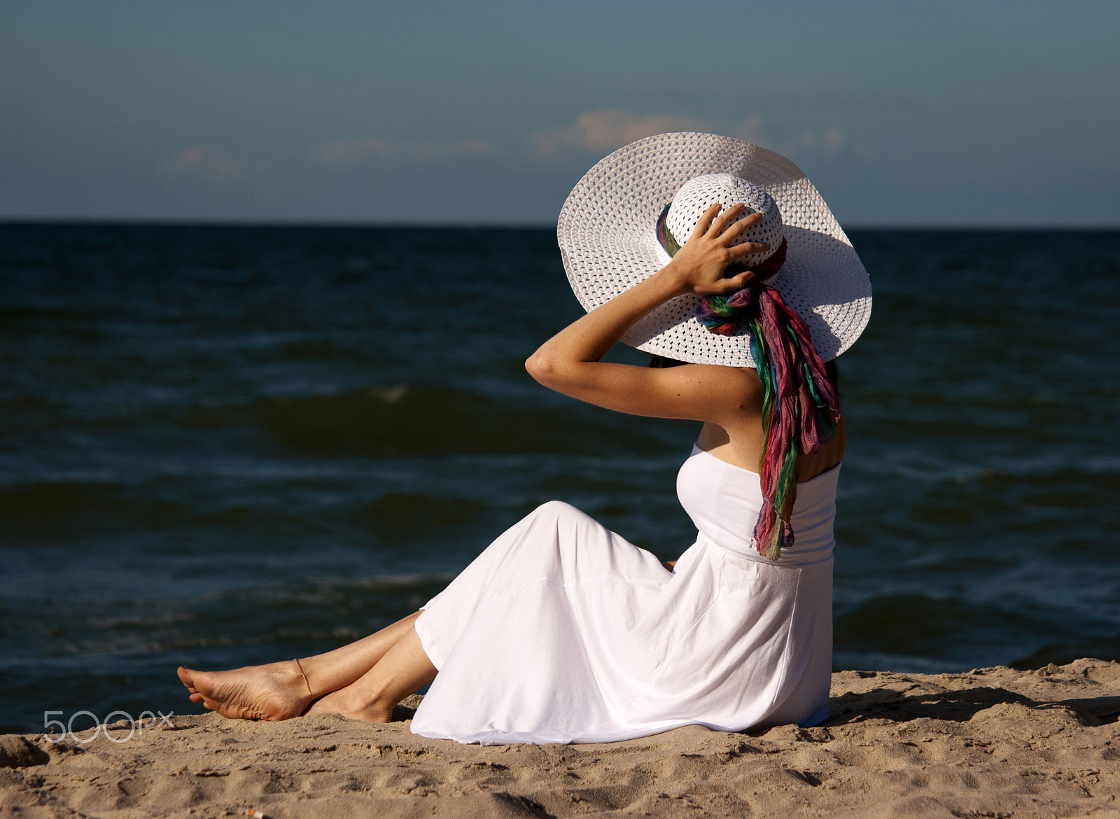 Sigma 50-200mm F4-5.6 DC OS HSM sample photo. Young beautiful woman in a white dress on the beach photography
