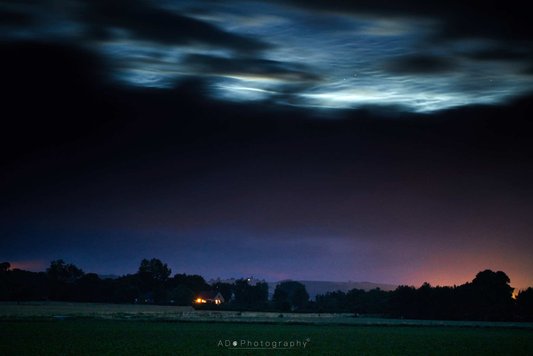 100mm F2.8 G SSM OSS sample photo. Shining behind the storm photography