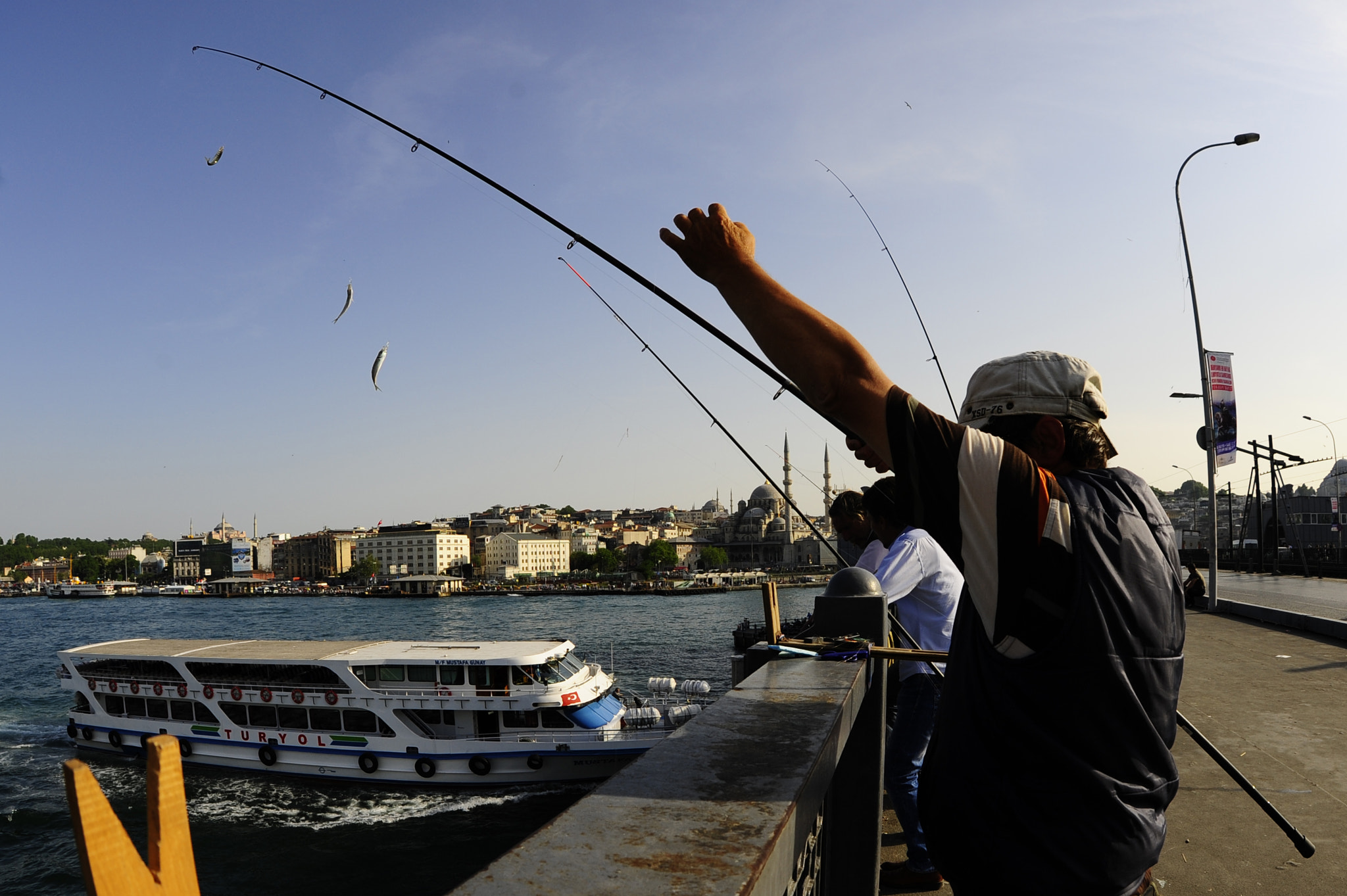 Nikon D700 + Sigma 15mm F2.8 EX DG Diagonal Fisheye sample photo. Fisherman photography