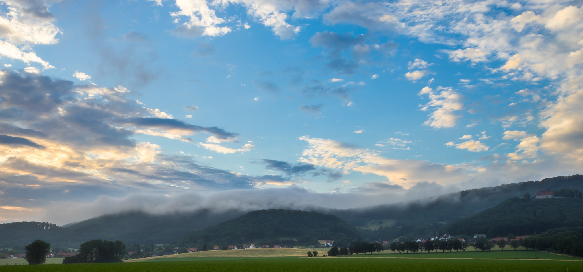 Tamron 18-270mm F3.5-6.3 Di II PZD sample photo. Waves over the mountain photography