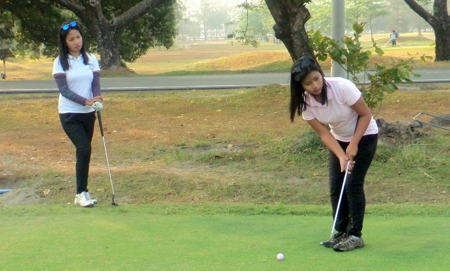Sony Cyber-shot DSC-TF1 sample photo. Golfing girls photography