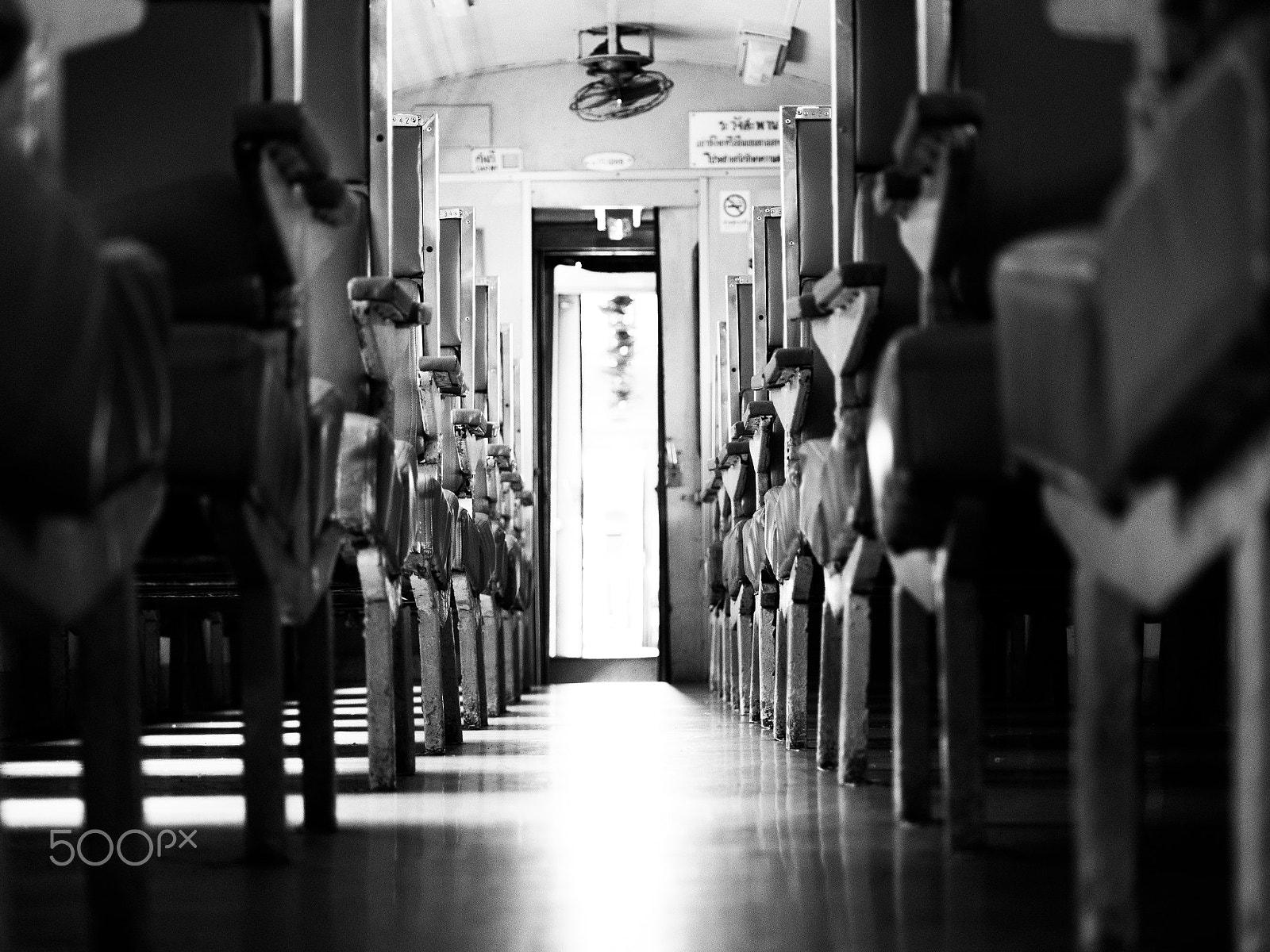 Panasonic Lumix G X Vario 35-100mm F2.8 OIS sample photo. Path way between seats photography