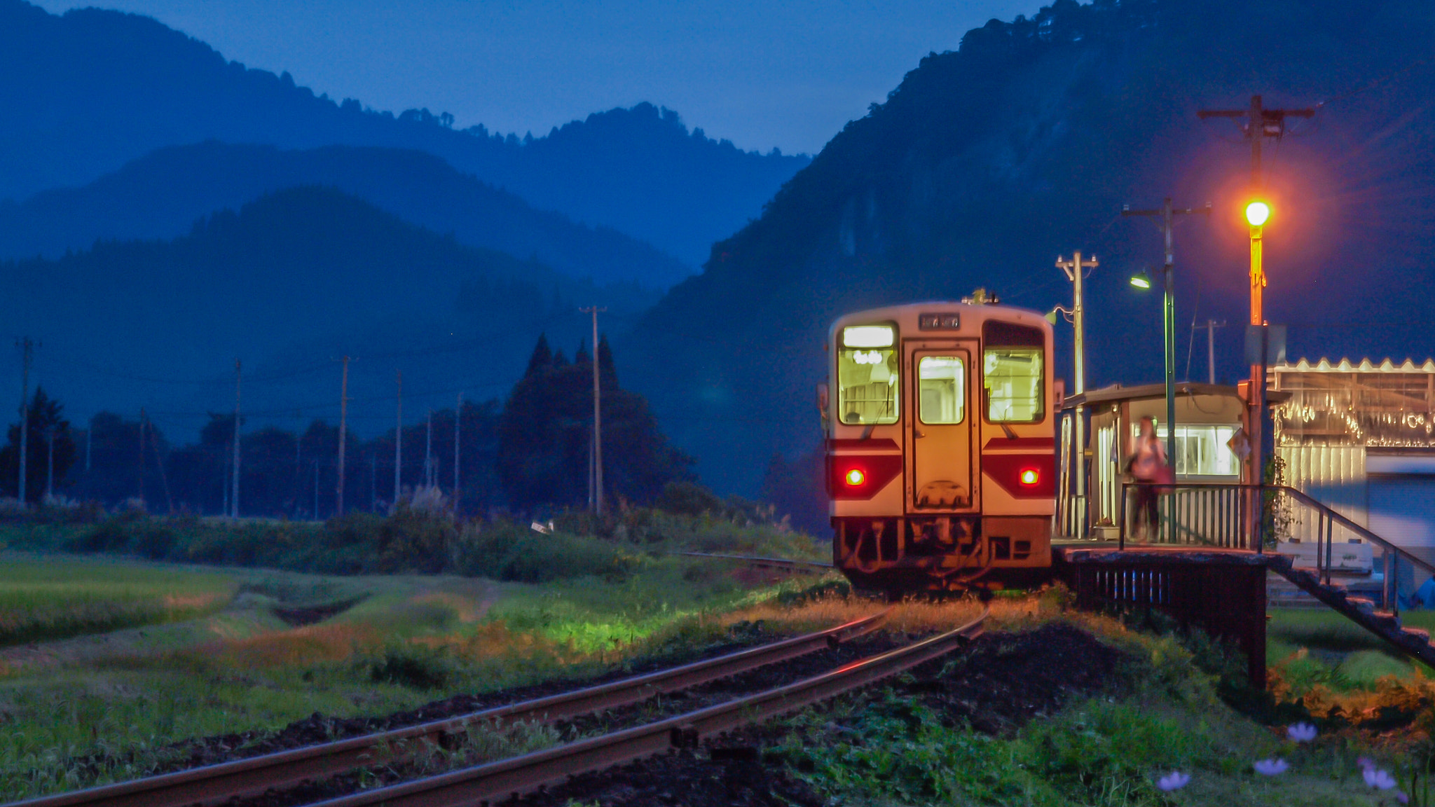 OLYMPUS 18mm-180mm Lens sample photo. Evening train photography