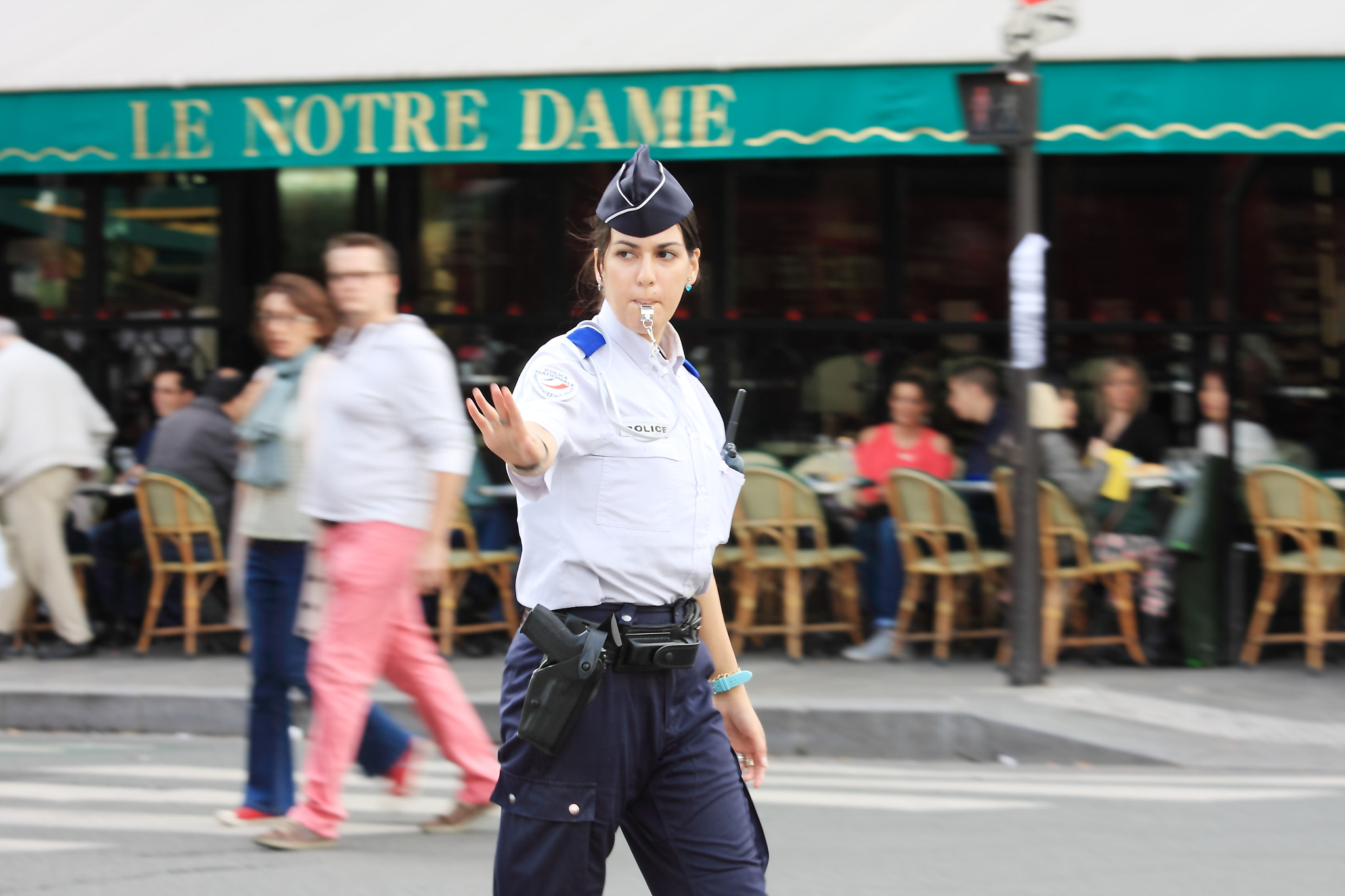 Canon EOS 40D + Canon EF 70-200mm F4L IS USM sample photo. Female police on duty photography