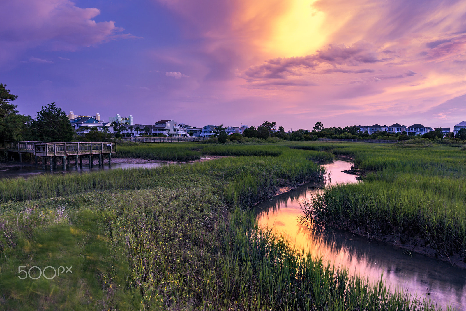 Sony a6000 + Sony Vario-Tessar T* FE 16-35mm F4 ZA OSS sample photo. Cherry grove channel marsh sunset photography