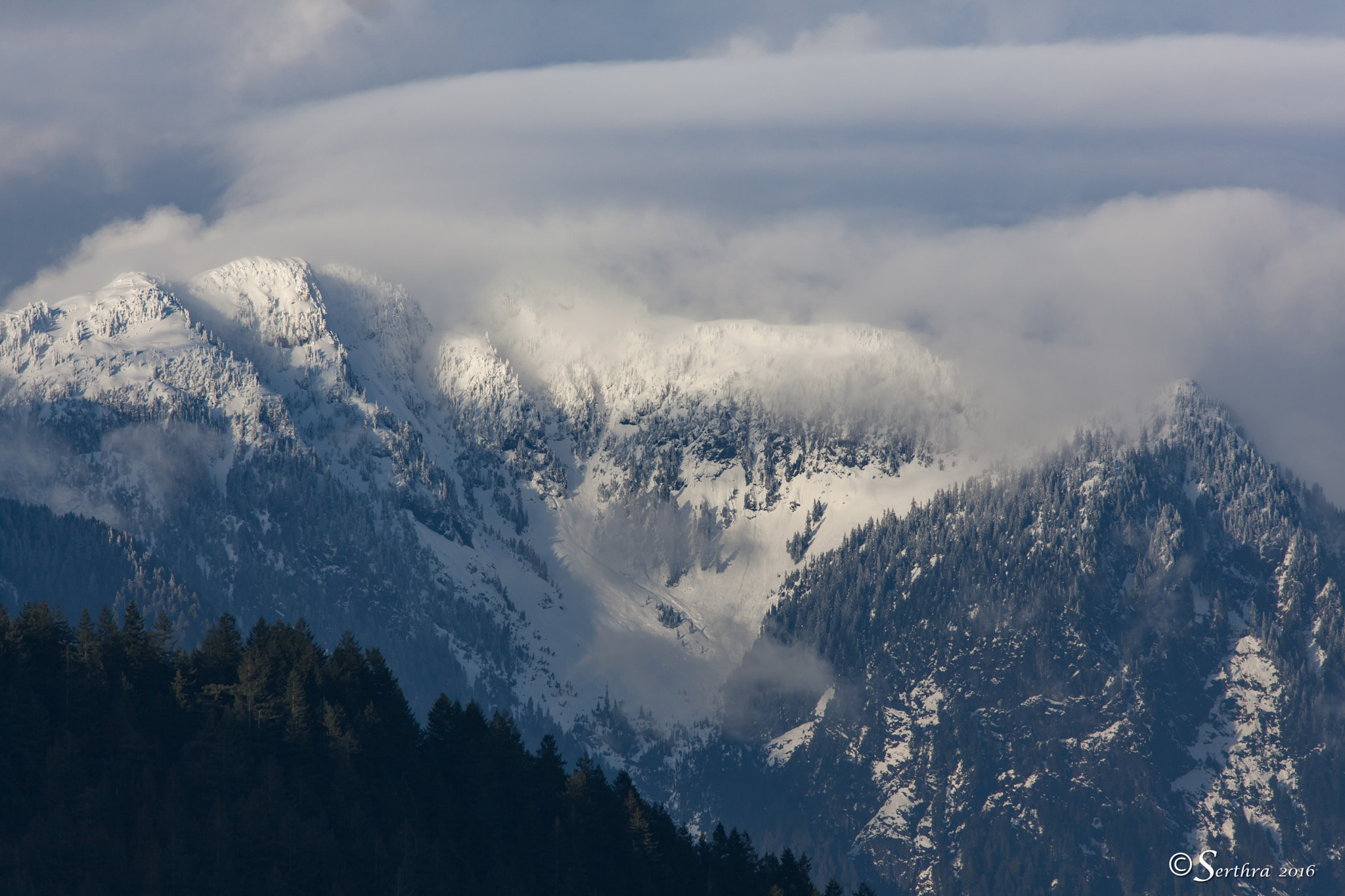 150-600mm F5-6.3 DG OS HSM | Contemporary 015 sample photo. Snow and clouds on the mountaintop photography