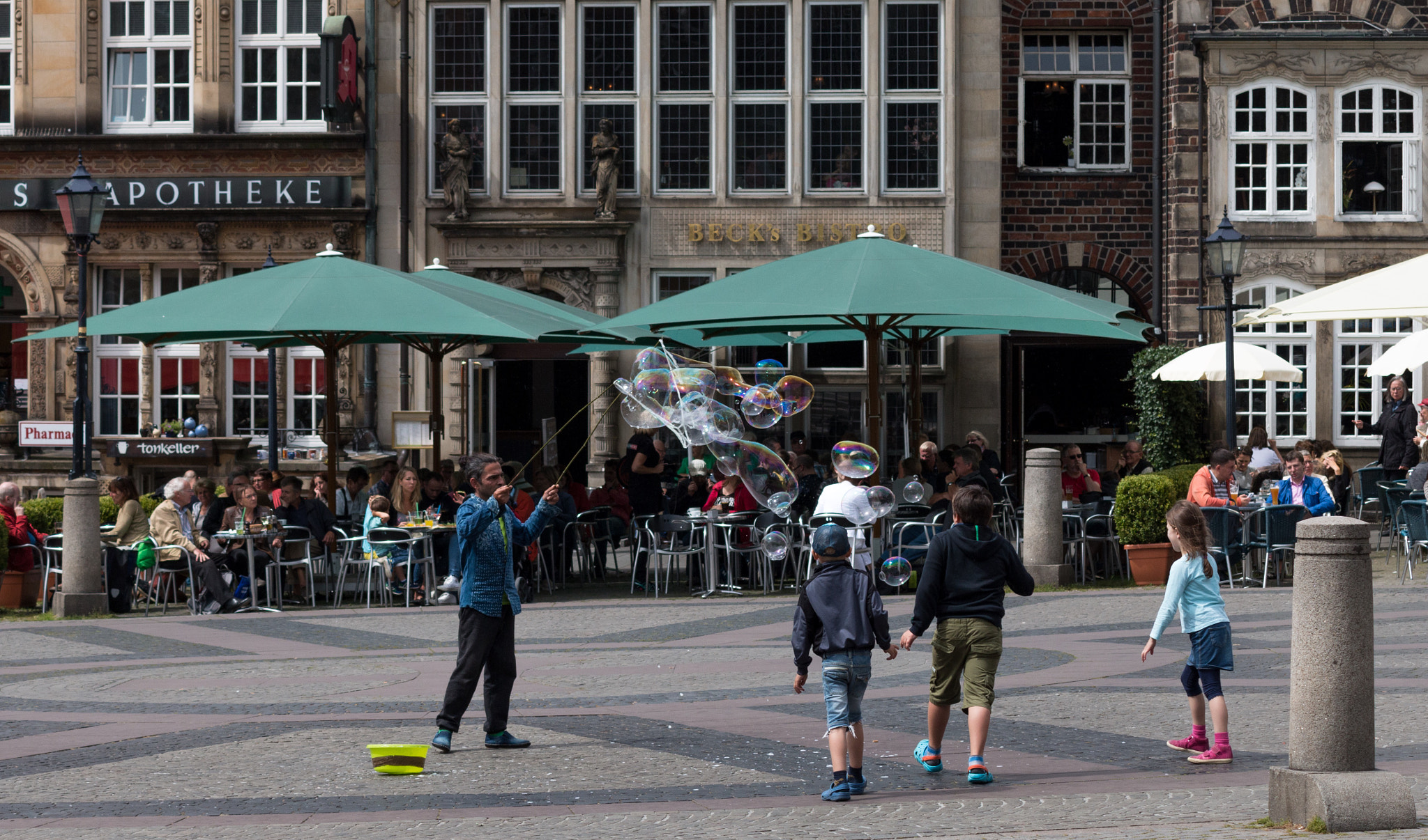 Tamron AF 70-300mm F4-5.6 Di LD Macro sample photo. Soap bubble maker on guild hall square near roland ... photography