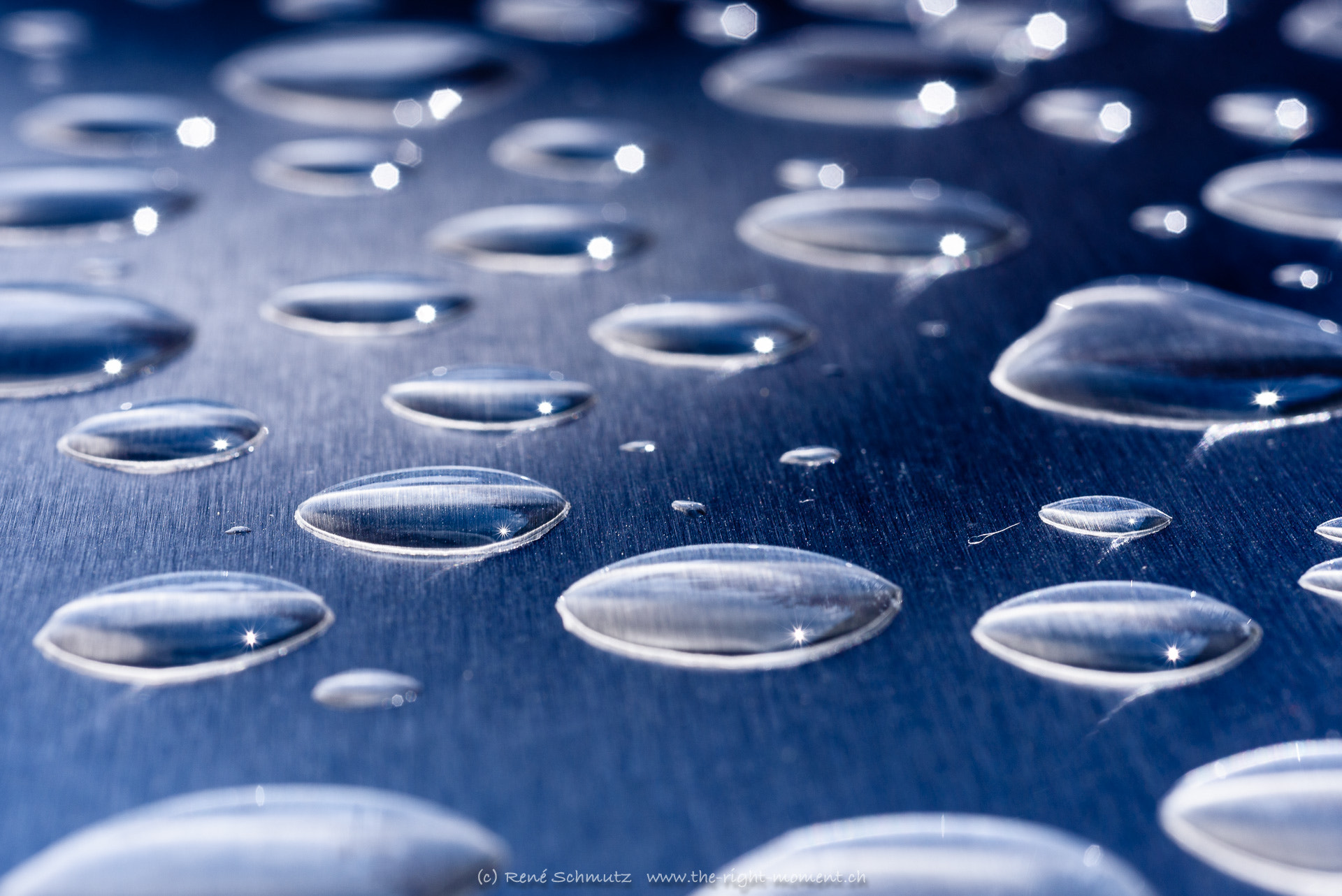 Nikon D750 + AF Micro-Nikkor 60mm f/2.8 sample photo. Rain drops on steel photography
