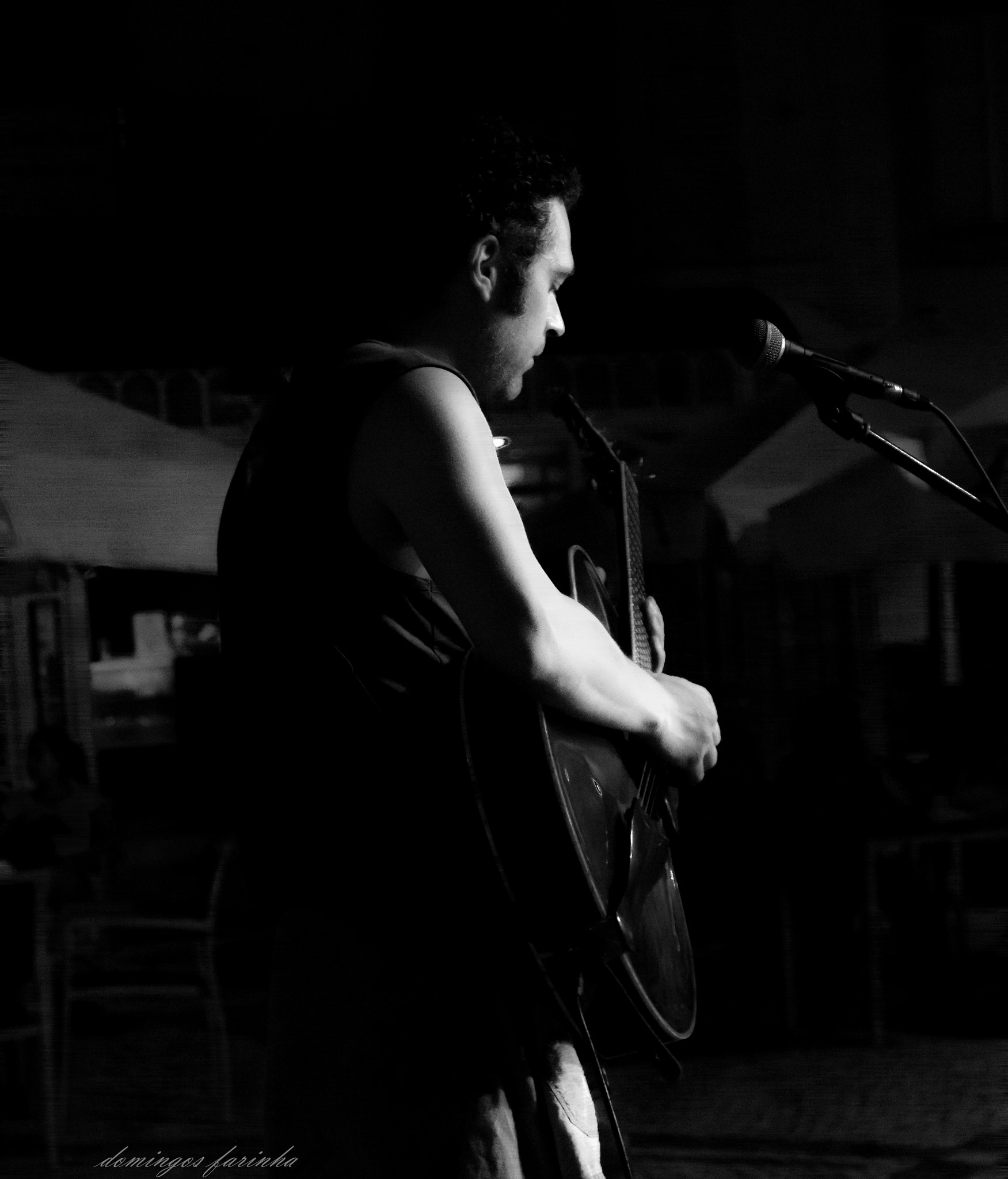 Sigma 17-70mm F2.8-4 DC Macro OS HSM sample photo. The man and his guitar.... photography