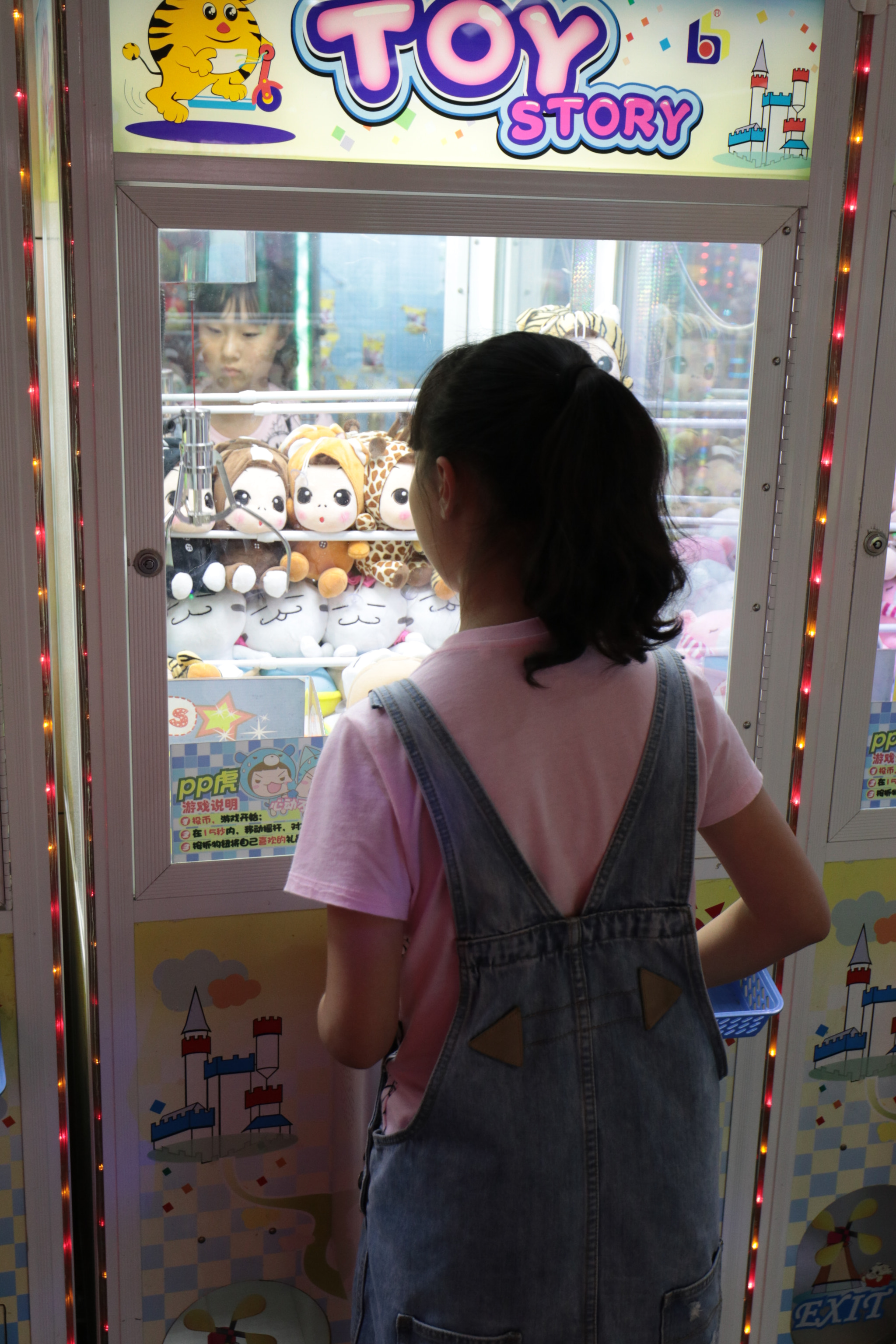 Canon EOS 80D + Canon EF 16-35mm F4L IS USM sample photo. A toy story. a reflected face. photography