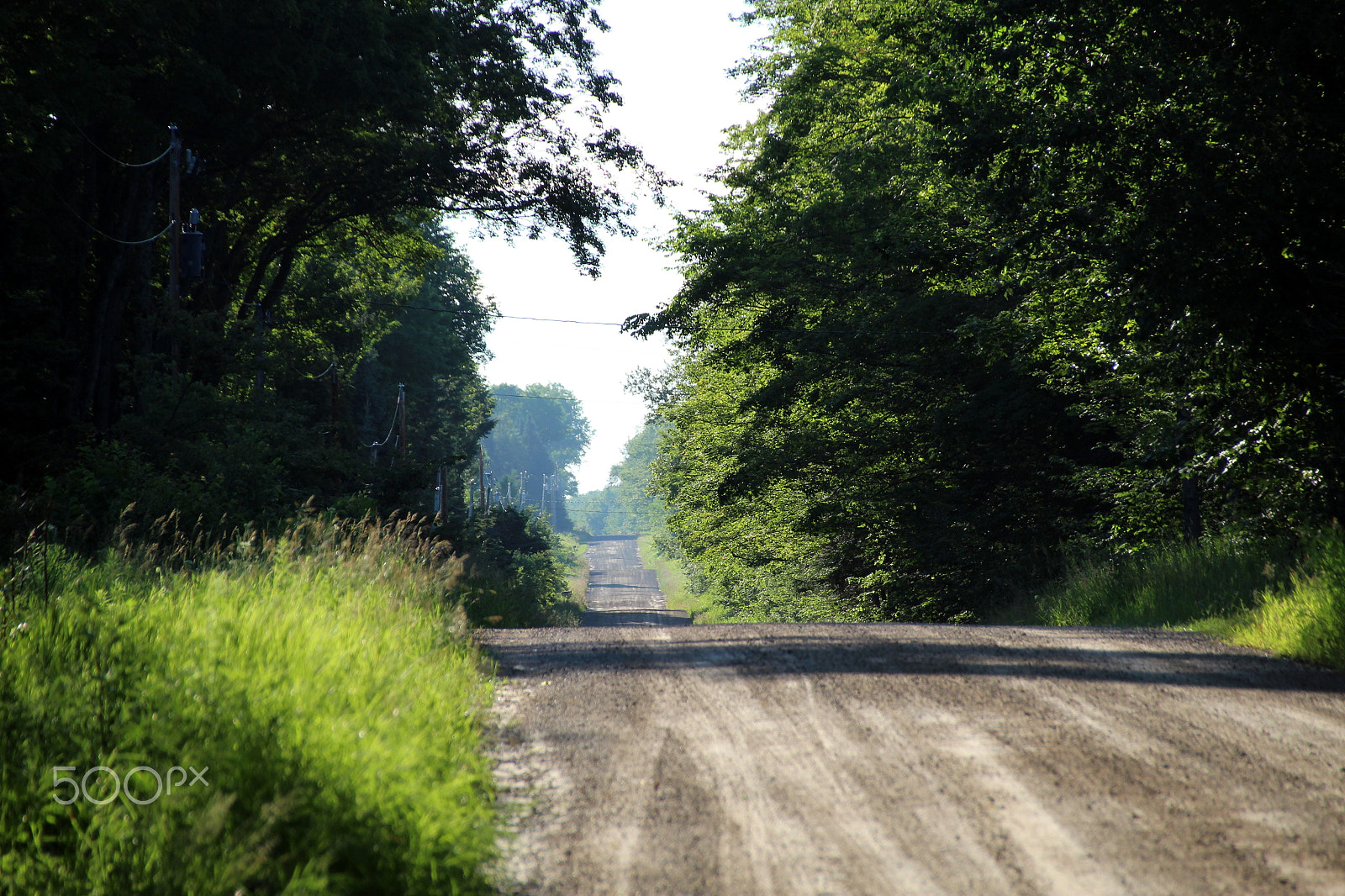 Sigma 18-250mm F3.5-6.3 DC OS HSM sample photo. Road in rock photography