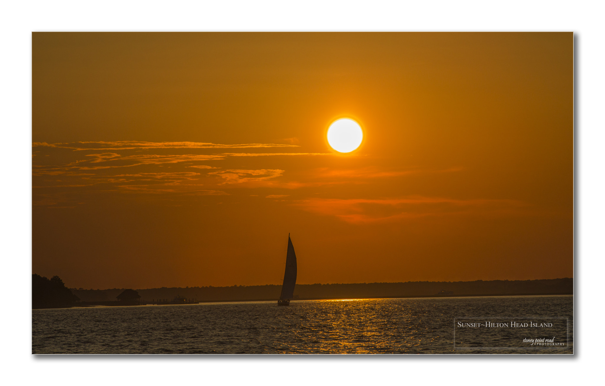 Canon EF 75-300mm f/4-5.6 USM sample photo. Sunset and boat photography