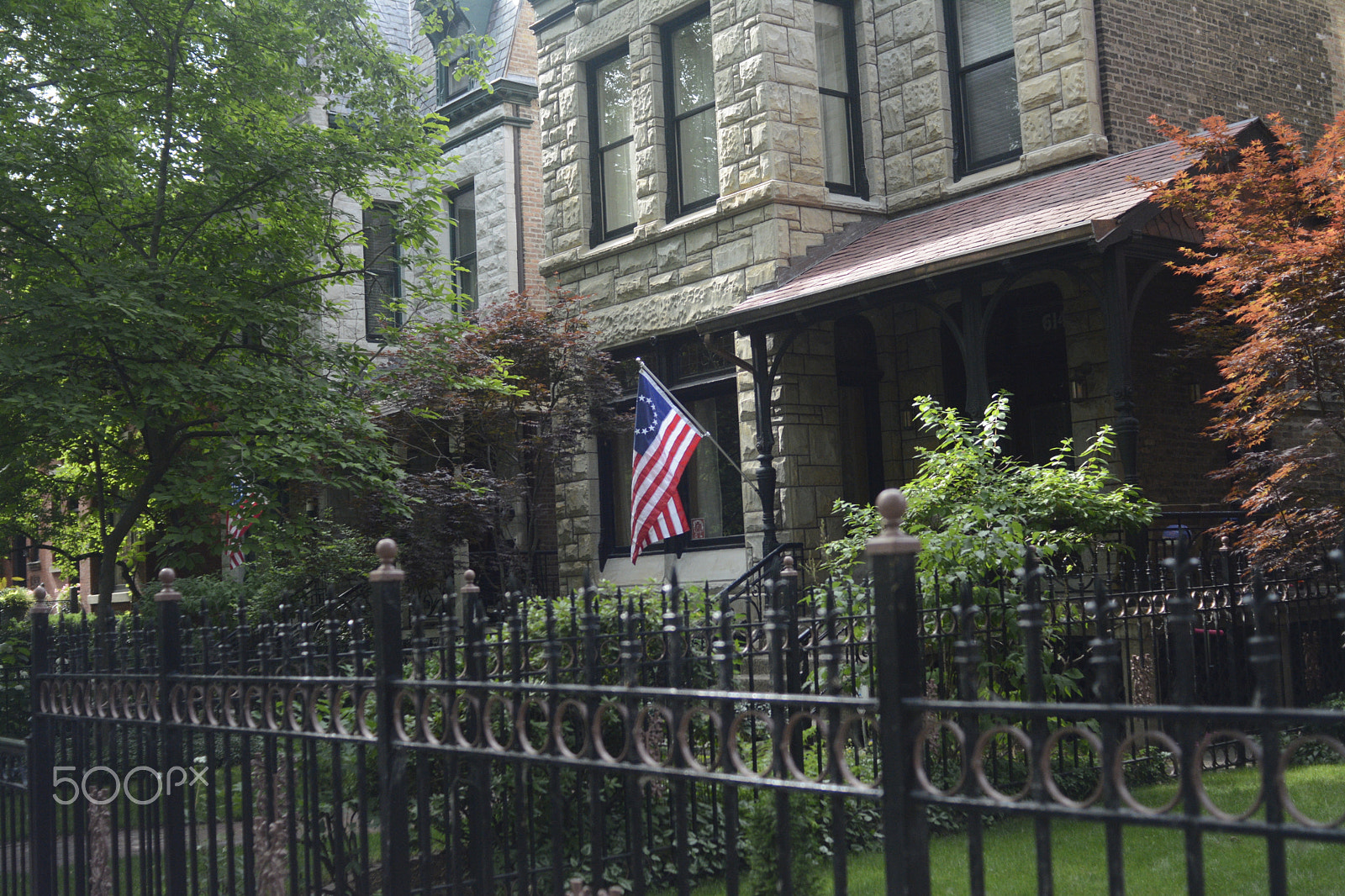 Nikon D7100 + AF Nikkor 28mm f/2.8 sample photo. Chicago architecture with american flag photography