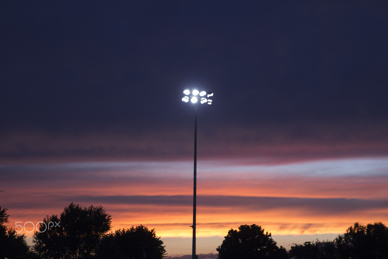 Canon EF 24-70mm F2.8L II USM sample photo. Baseball lights at sunset photography