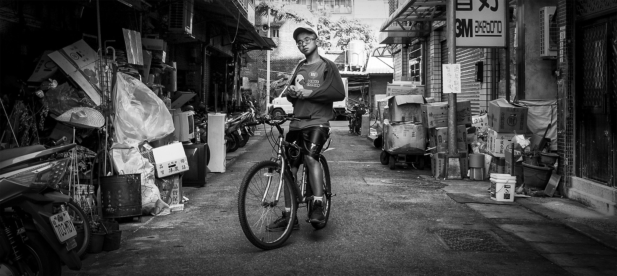 Sigma 10-20mm F3.5 EX DC HSM sample photo. Boy and bicycle photography