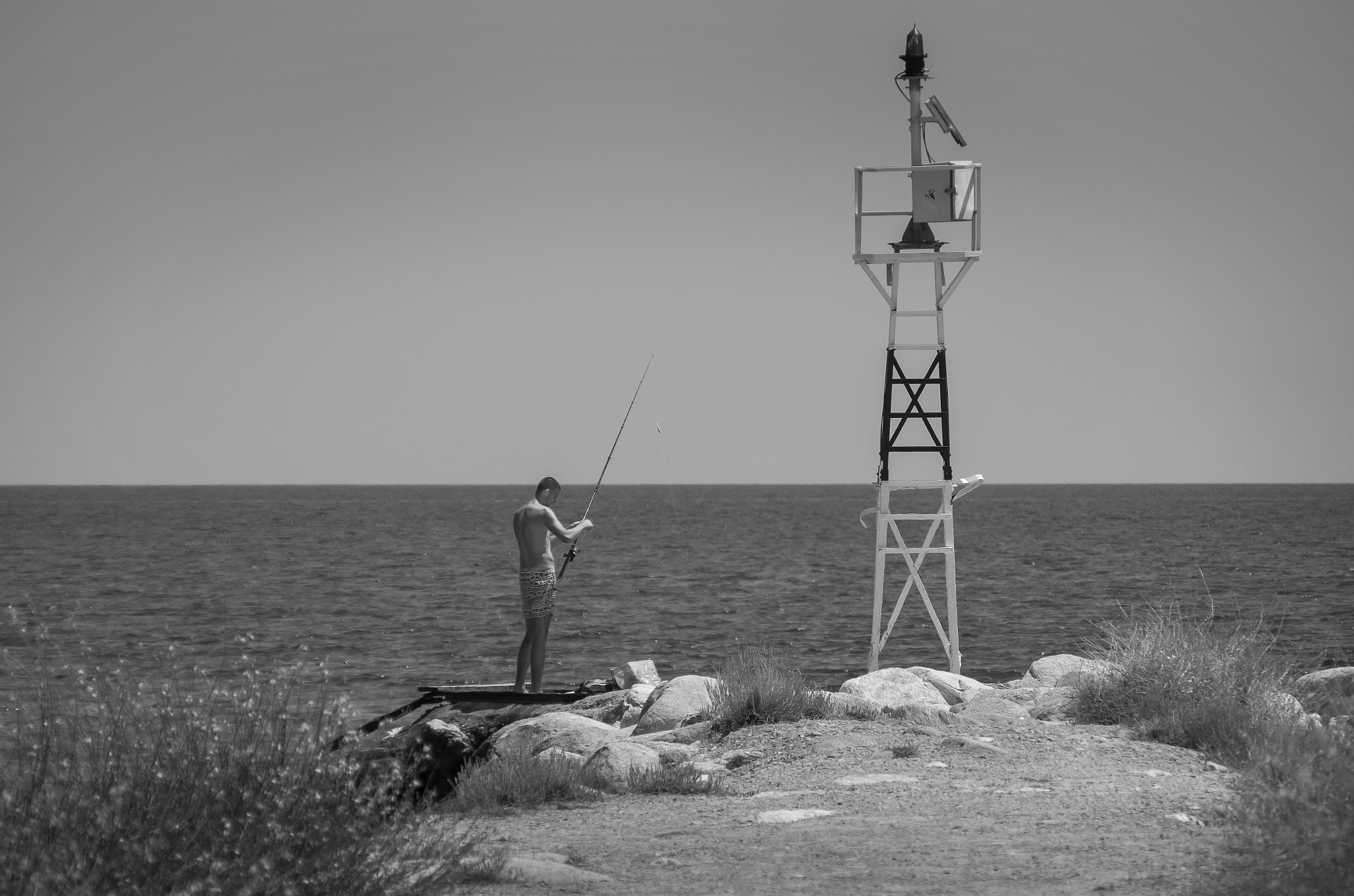 Pentax K-01 + Sigma 18-250mm F3.5-6.3 DC OS HSM sample photo. Fisherman photography