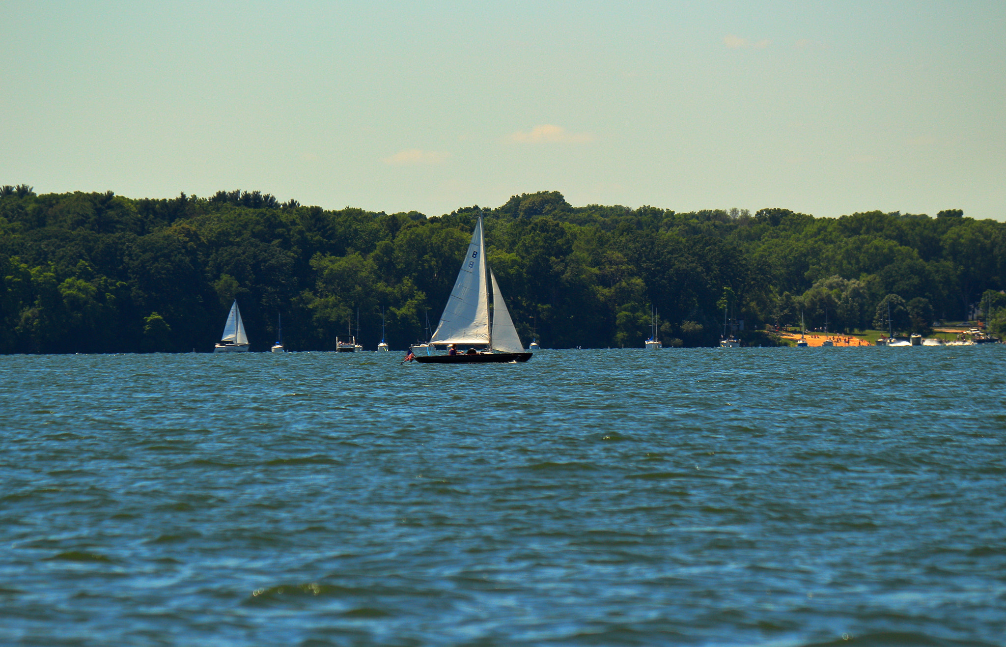 Canon EOS 100D (EOS Rebel SL1 / EOS Kiss X7) sample photo. Awesome sailboat on lake mendota in madison wi! photography