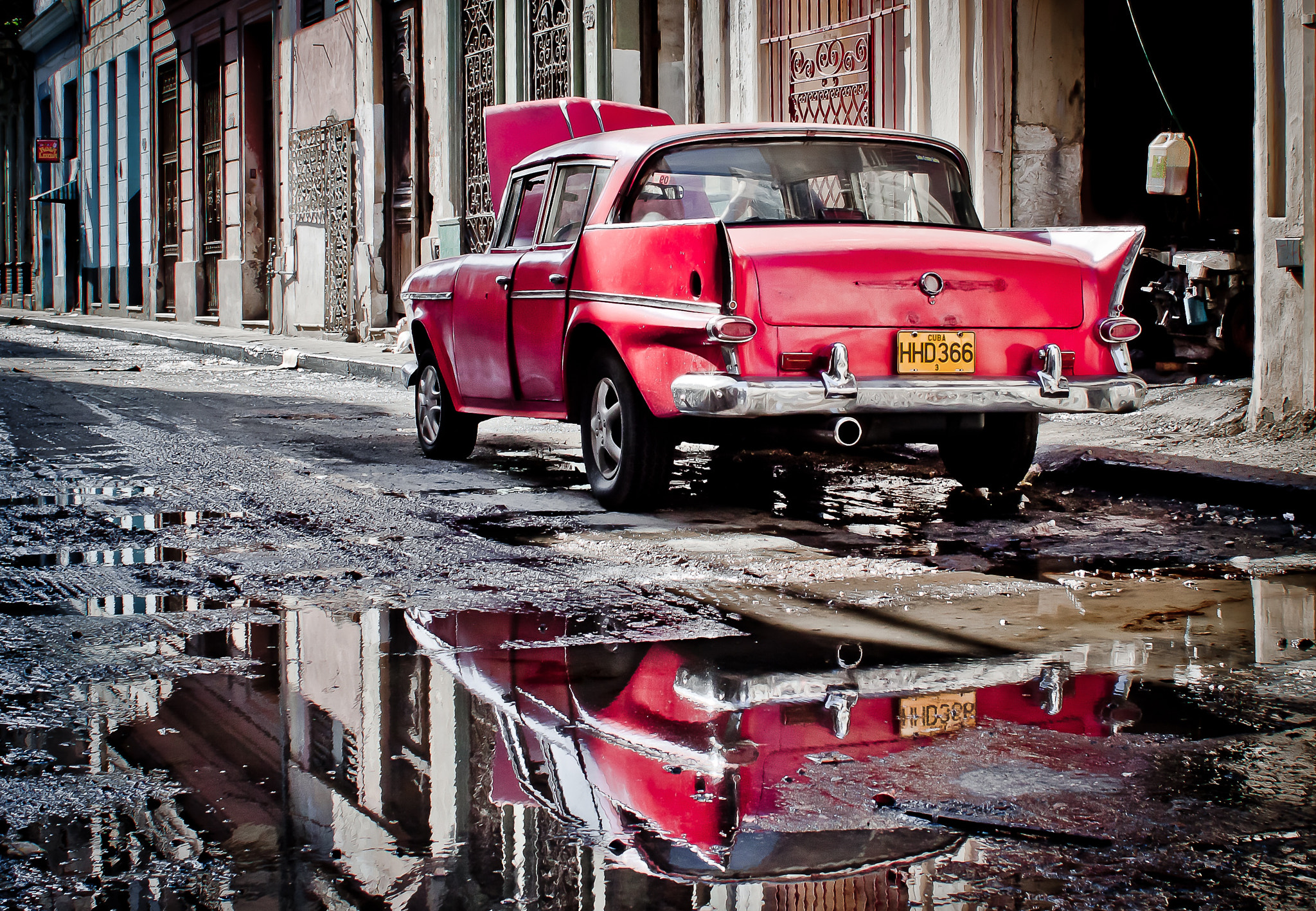 Canon EOS 50D + Canon EF 28mm F1.8 USM sample photo. The car red photography