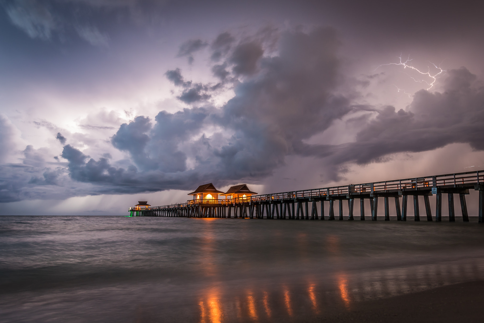 Sigma 18-35mm f/1.8 DC HSM sample photo. Night pier under storm photography