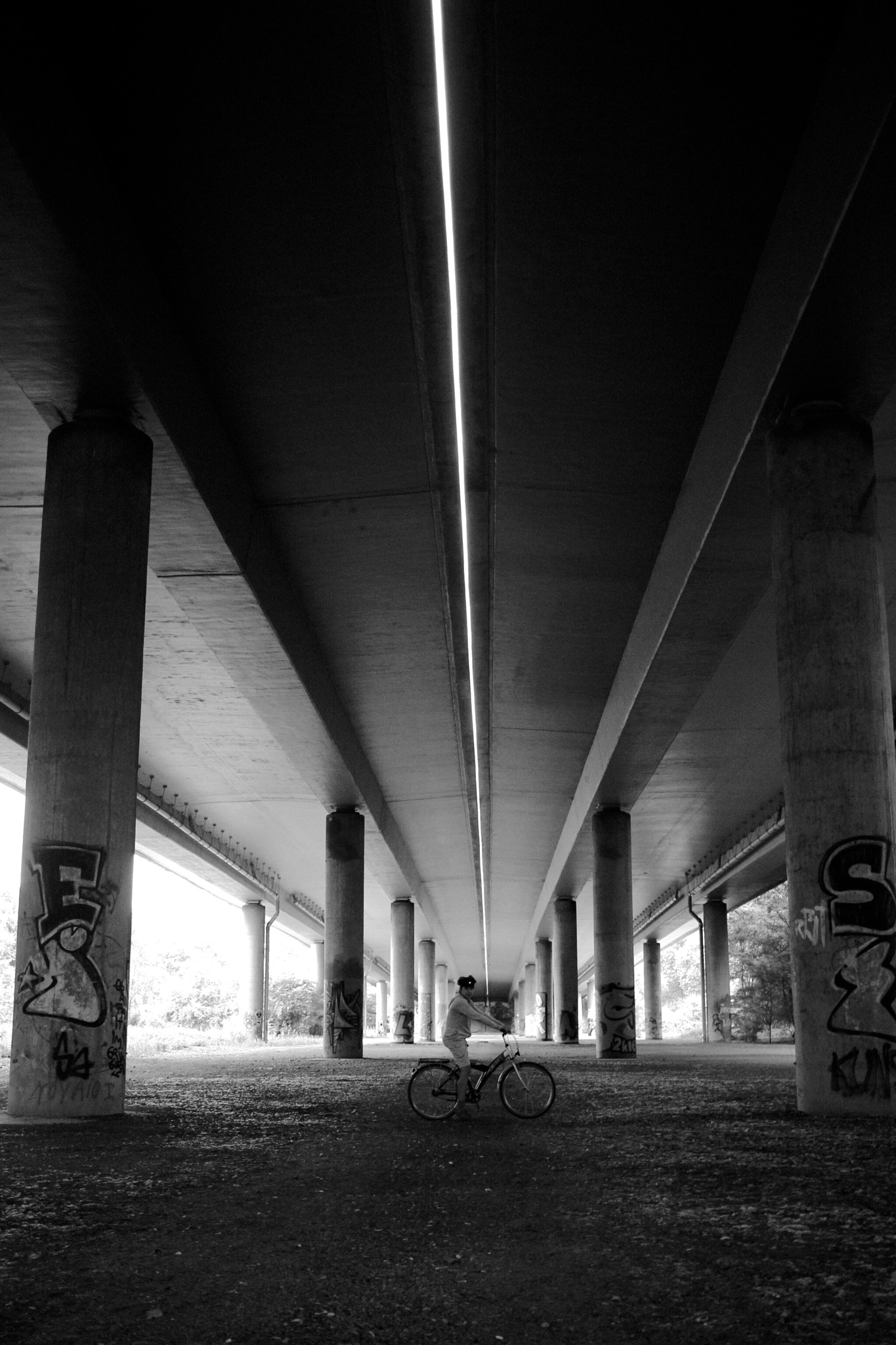 Canon EF-S 24mm F2.8 STM sample photo. Graffiti columns photography