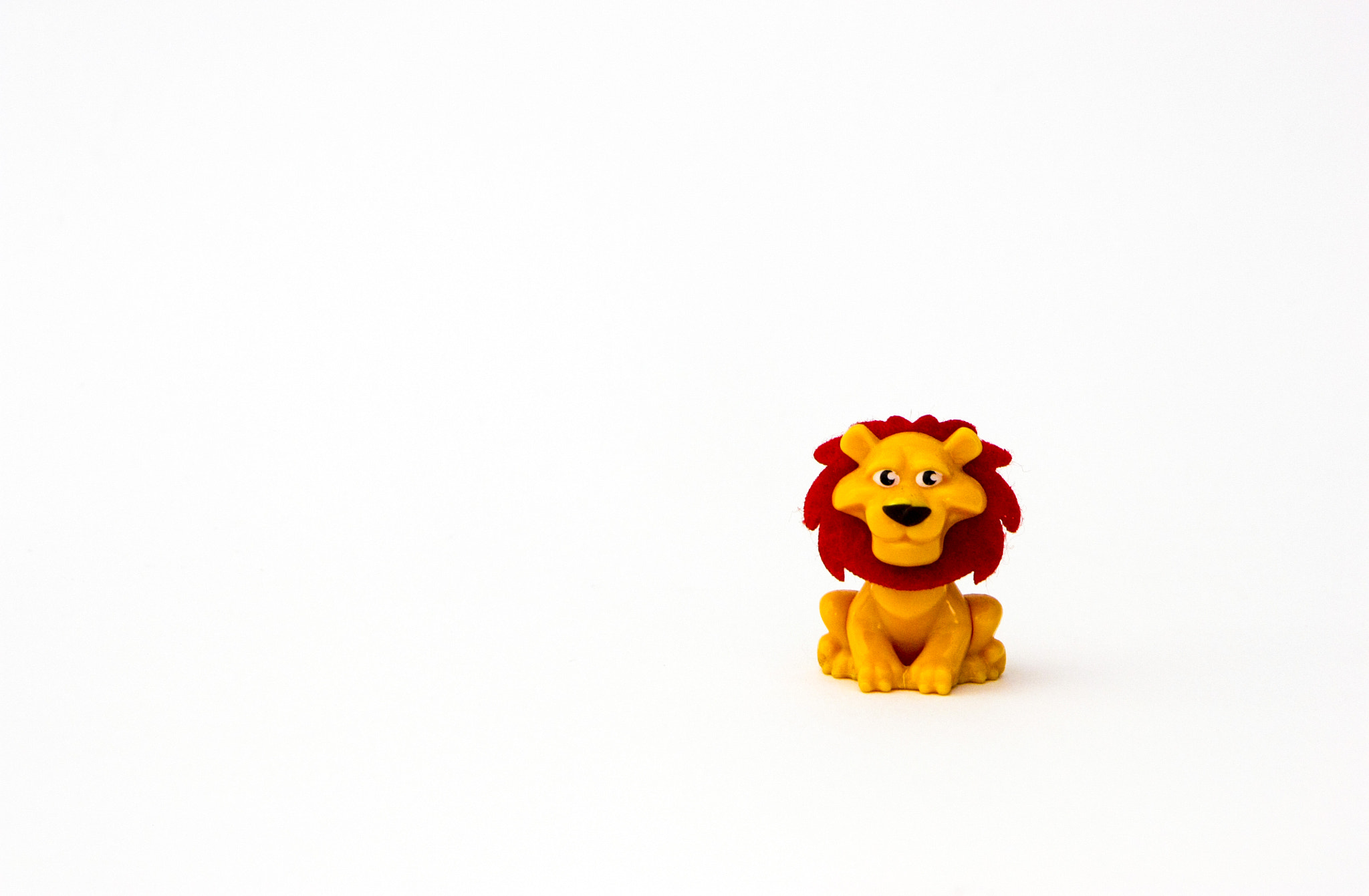 Canon EF 35-105mm f/3.5-4.5 sample photo. Toy lion photography