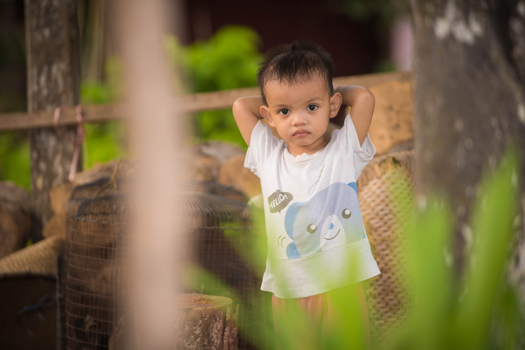AF-S Zoom-Nikkor 80-200mm f/2.8D IF-ED sample photo. Young boy playing in the village photography