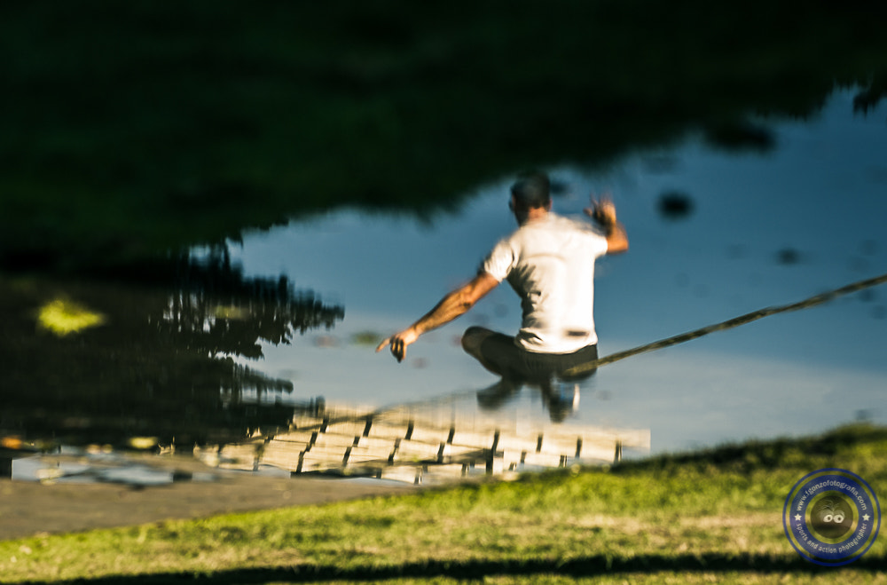 Nikon AF-Nikkor 80-200mm F2.8D ED sample photo. Reflection of a slack line stunter. photography