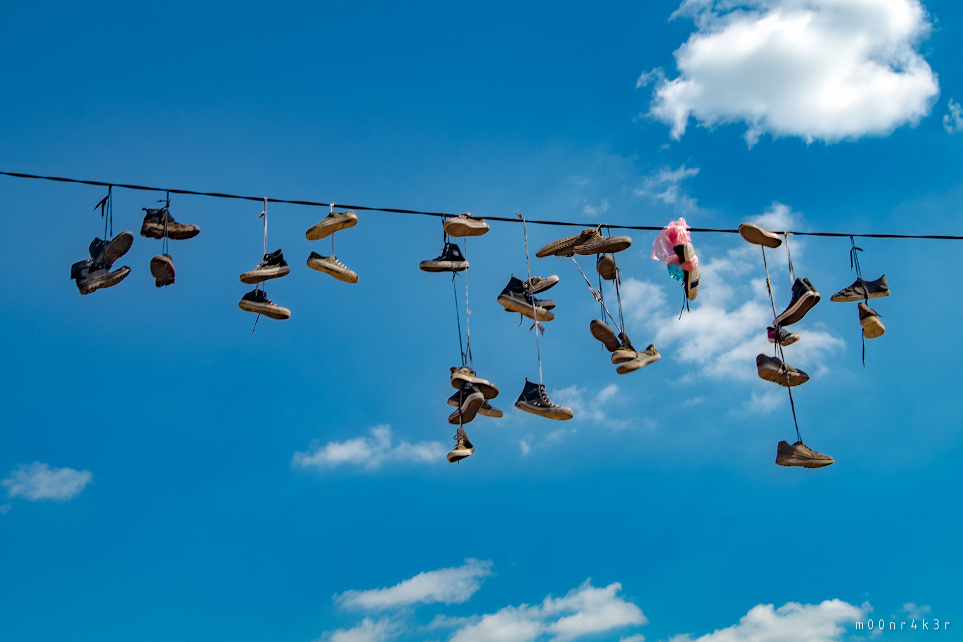 Pentax K-S2 sample photo. Shoes in the sky photography