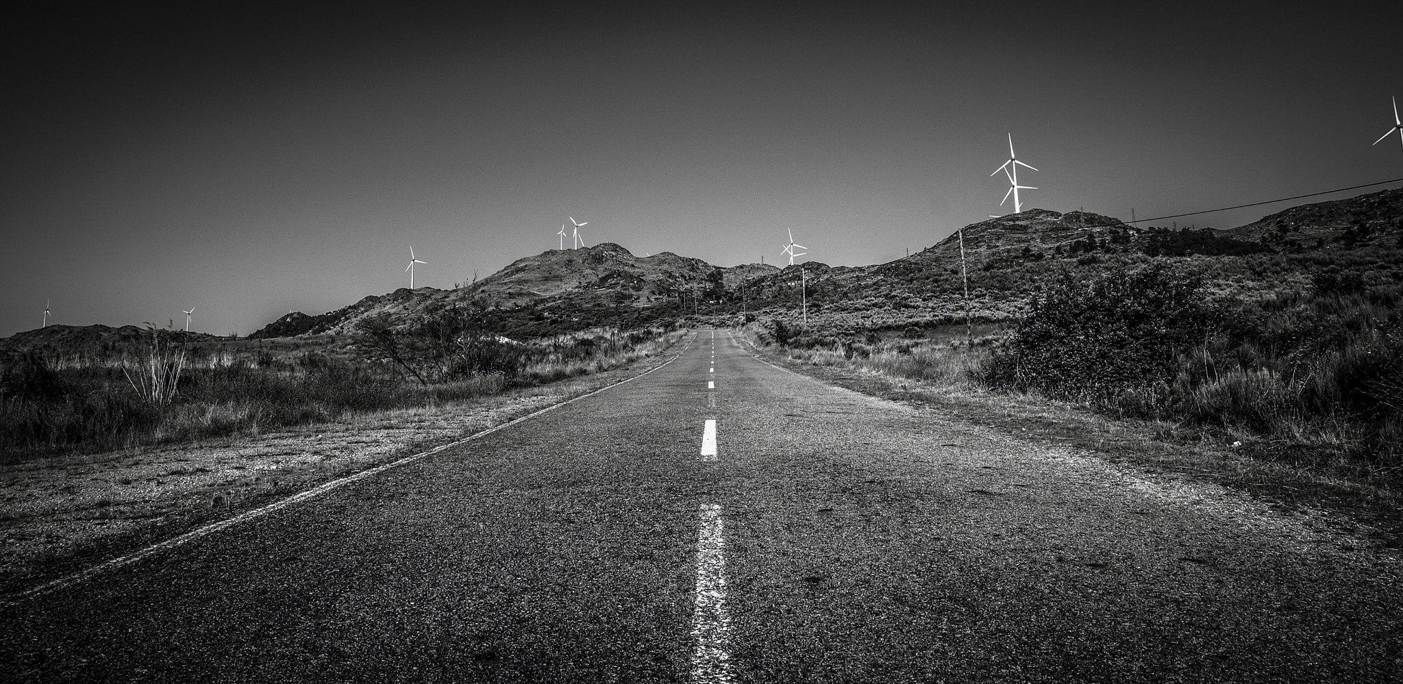 Sony DT 16-105mm F3.5-5.6 sample photo. One direction on a dark road photography