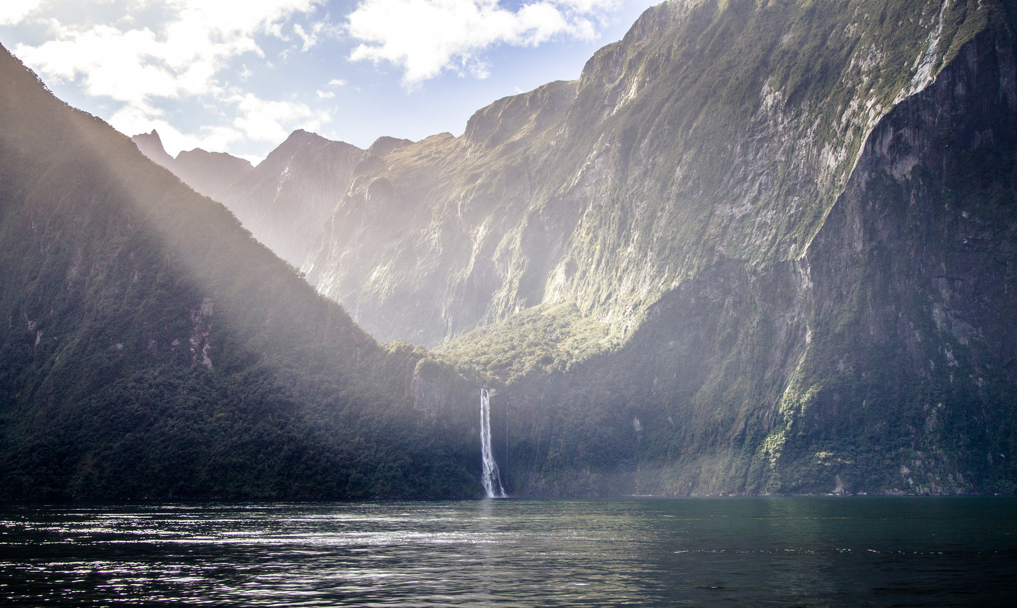 Canon EOS 1100D (EOS Rebel T3 / EOS Kiss X50) + Canon EF-S 10-22mm F3.5-4.5 USM sample photo. Milford sound waterfall photography
