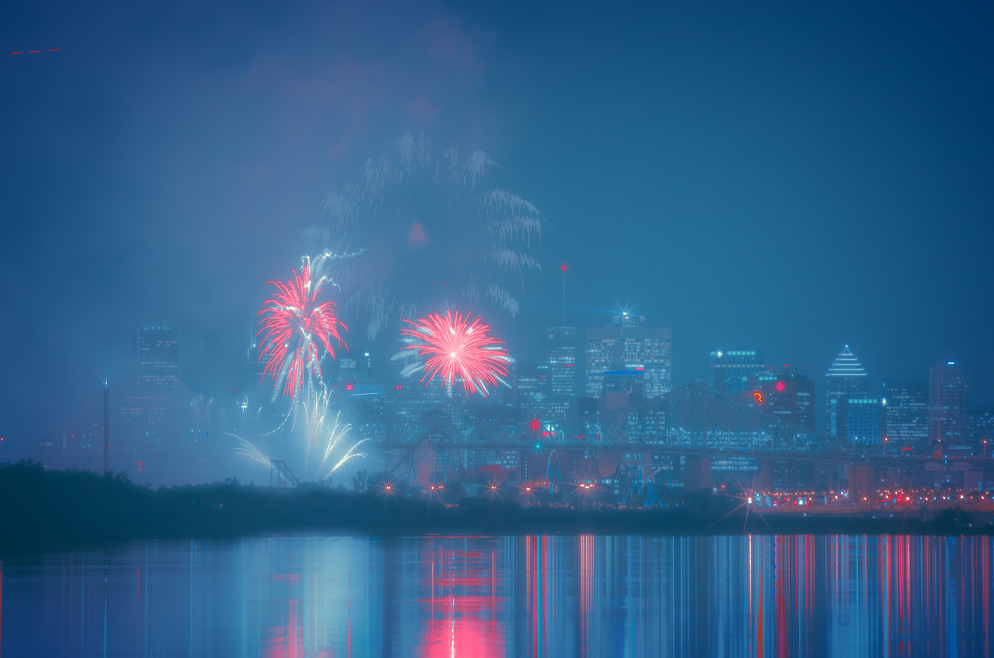 Nikon D7000 + Sigma 70-300mm F4-5.6 DG Macro sample photo. Fireworks in montreal photography