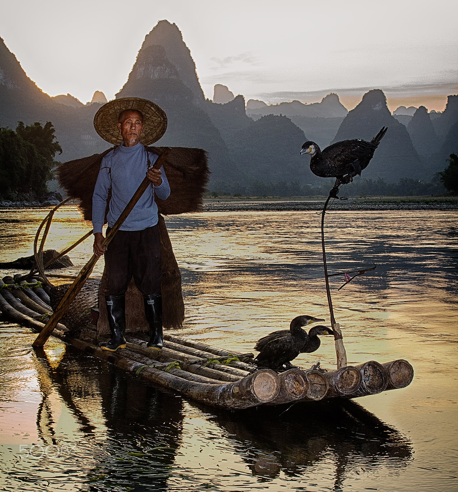 Canon EOS 60D + EF28-70mm f/2.8L USM sample photo. Cormorant fisherman at sunset - li river photography