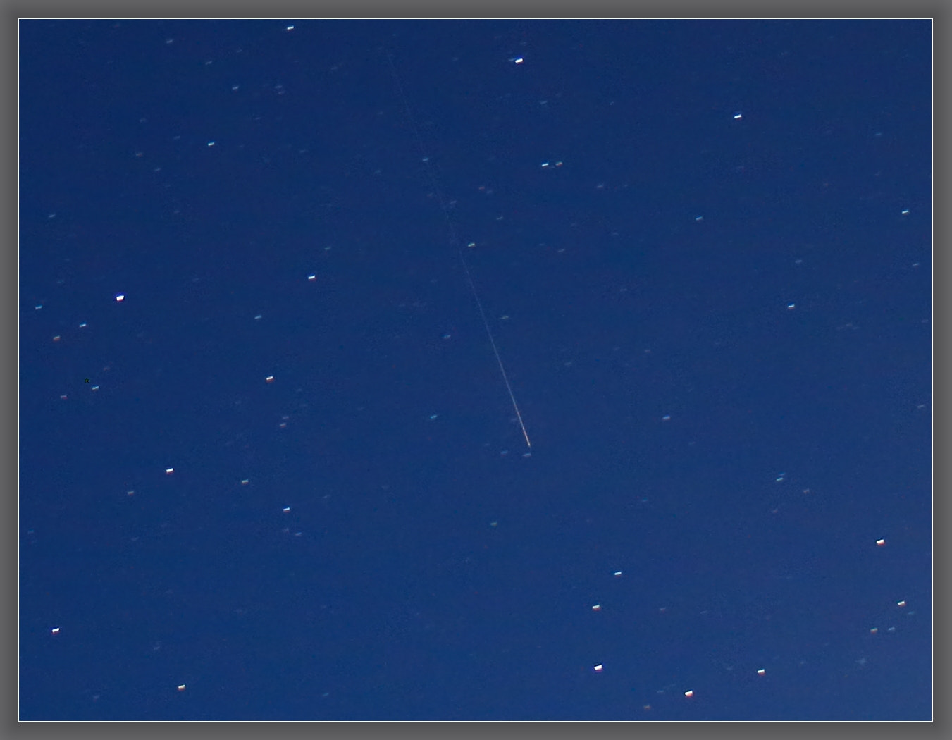 Canon EOS 750D (EOS Rebel T6i / EOS Kiss X8i) sample photo. A satellite exiting earth's shadow photography
