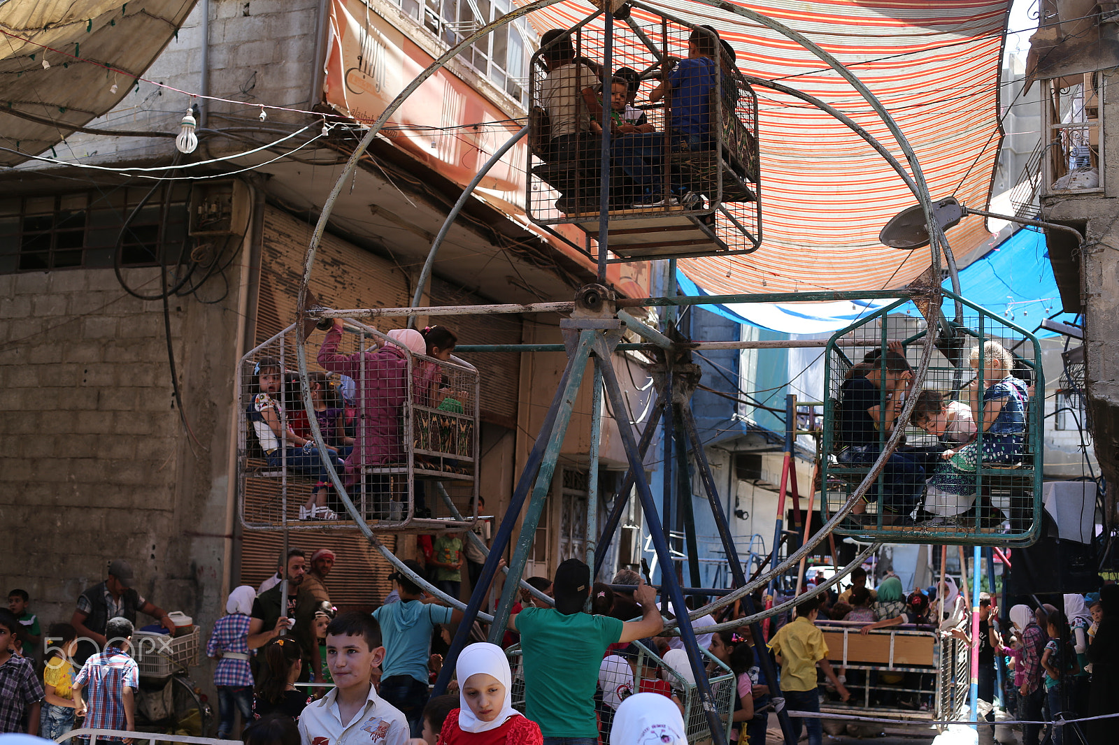 Canon EOS-1D X sample photo. فرح الأطفال المحاصرين بعيد الفطرالسعيد photography