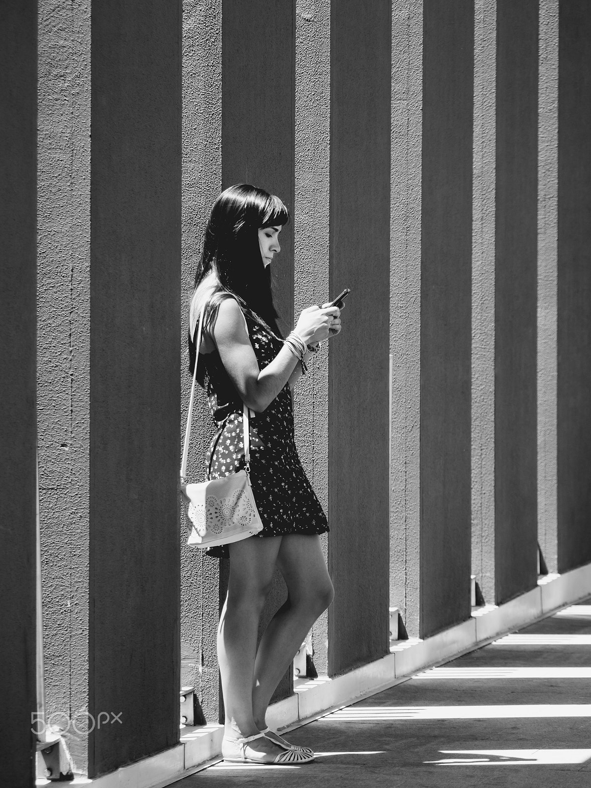 Panasonic Lumix DMC-GH3 sample photo. Young woman addicted to mobile phone photography
