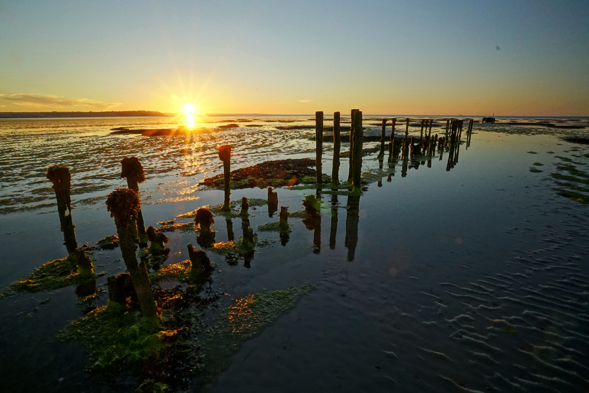 Sony a6300 + Sony E 10-18mm F4 OSS sample photo. Sunset poles 2 photography