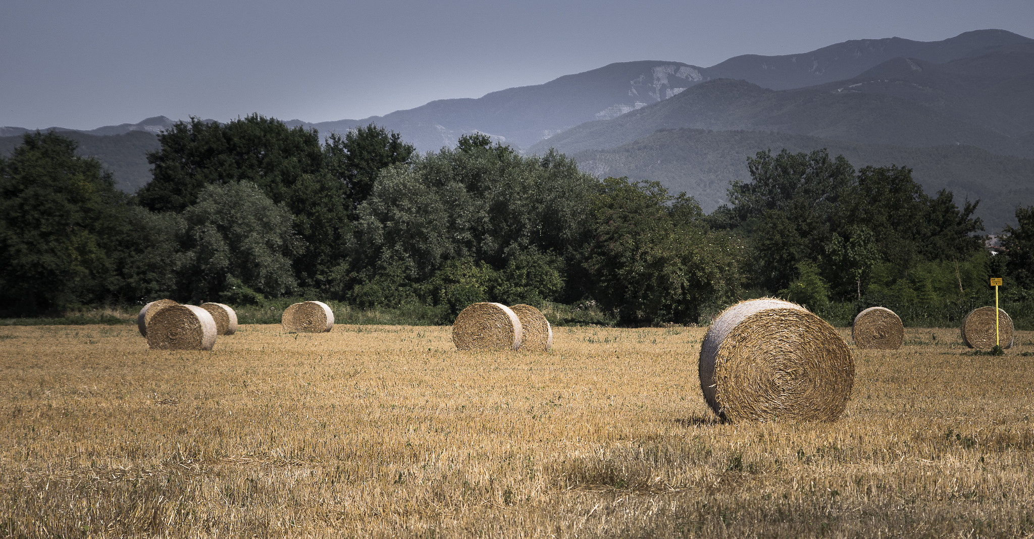Pentax smc DA 55-300mm F4.0-5.8 ED sample photo. Rolling hay photography