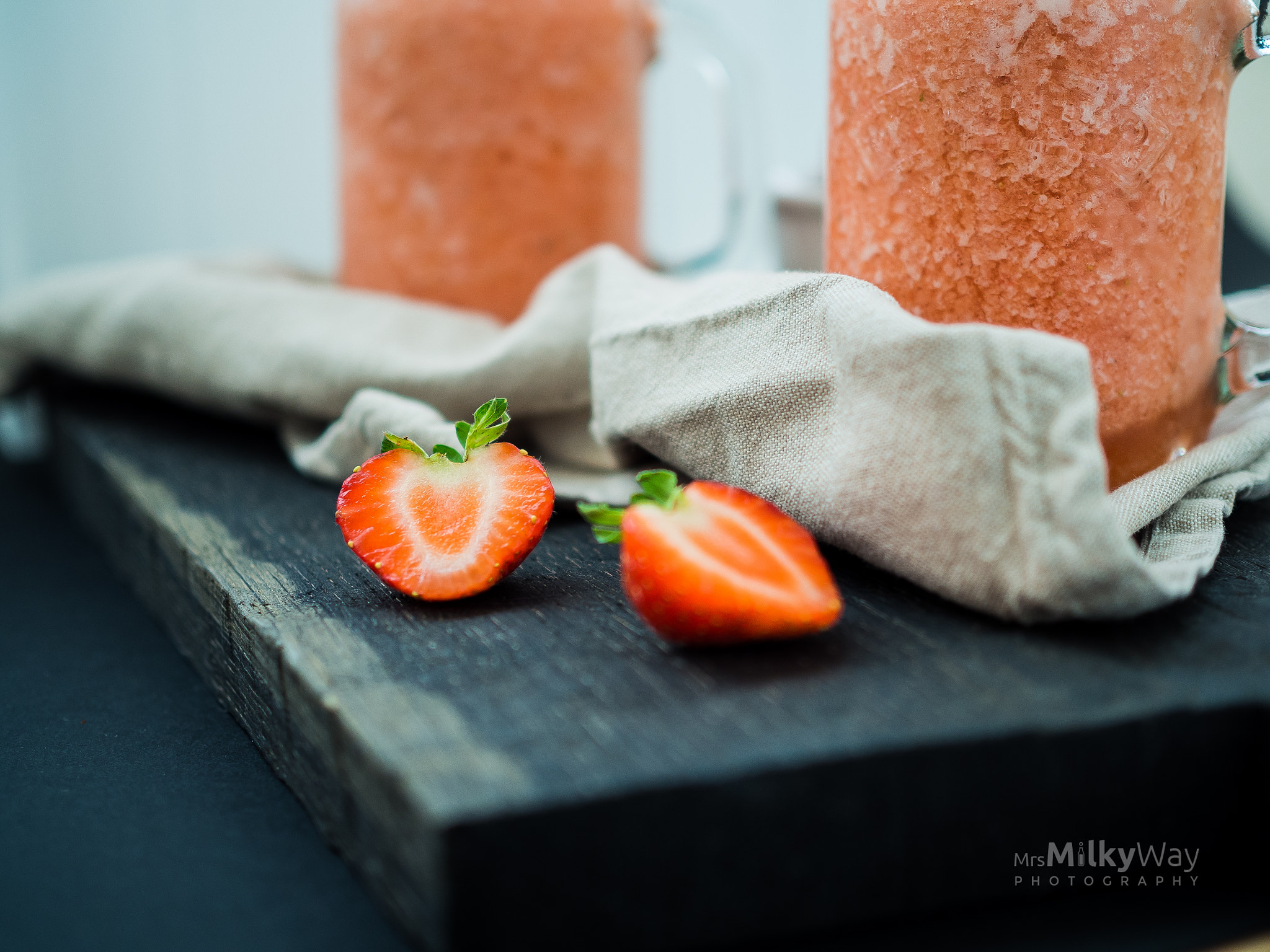 Olympus OM-D E-M10 II + Olympus M.Zuiko Digital 25mm F1.8 sample photo. Strawberry ice summer smoothie with fresh fruits photography