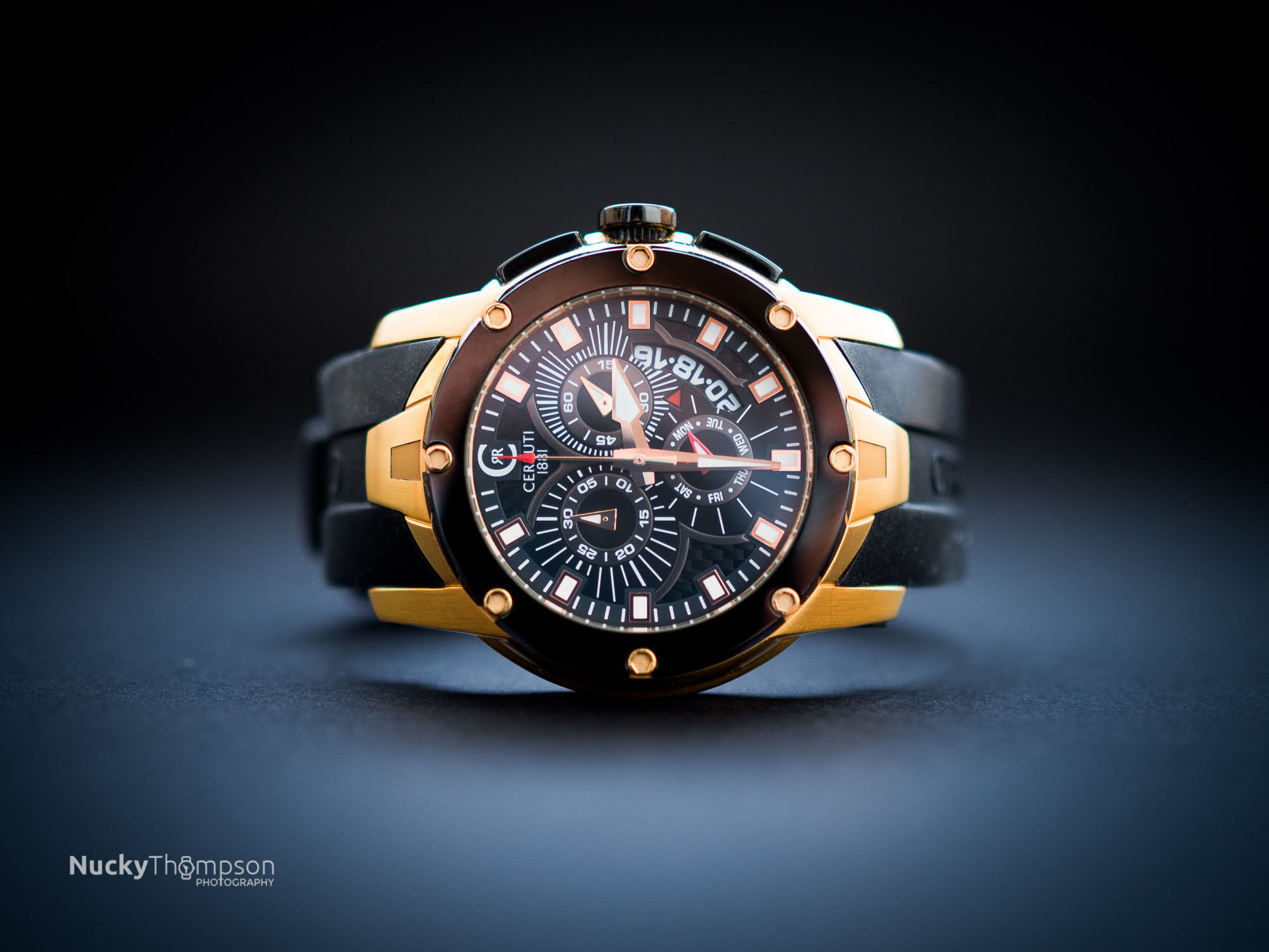 Olympus OM-D E-M10 II + Olympus M.Zuiko Digital 25mm F1.8 sample photo. Cerutti 1881 gold chronograph watch photo photography