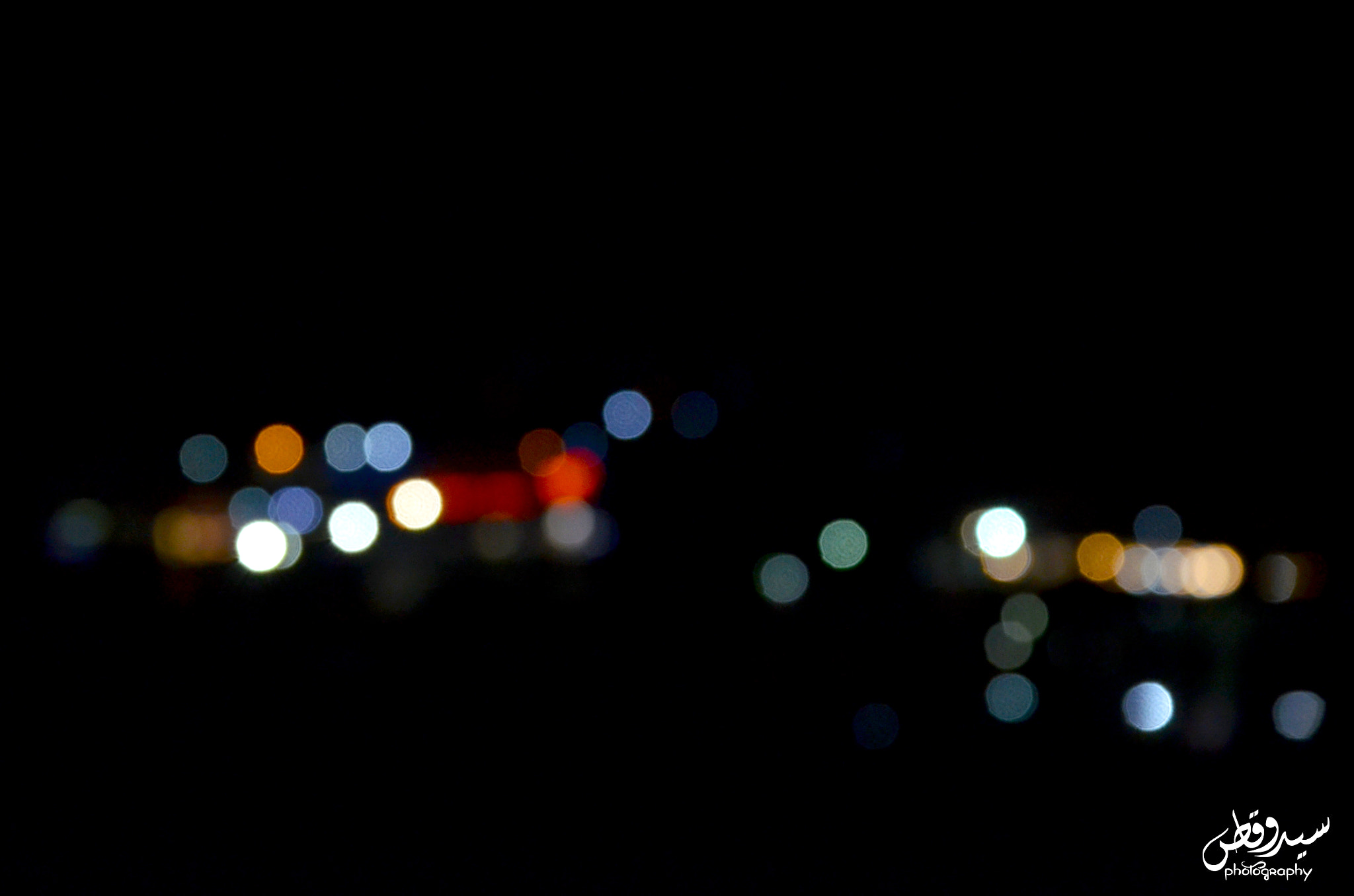Nikon AF-S Nikkor 500mm F4D ED-IF II sample photo. Blur of lights  photography