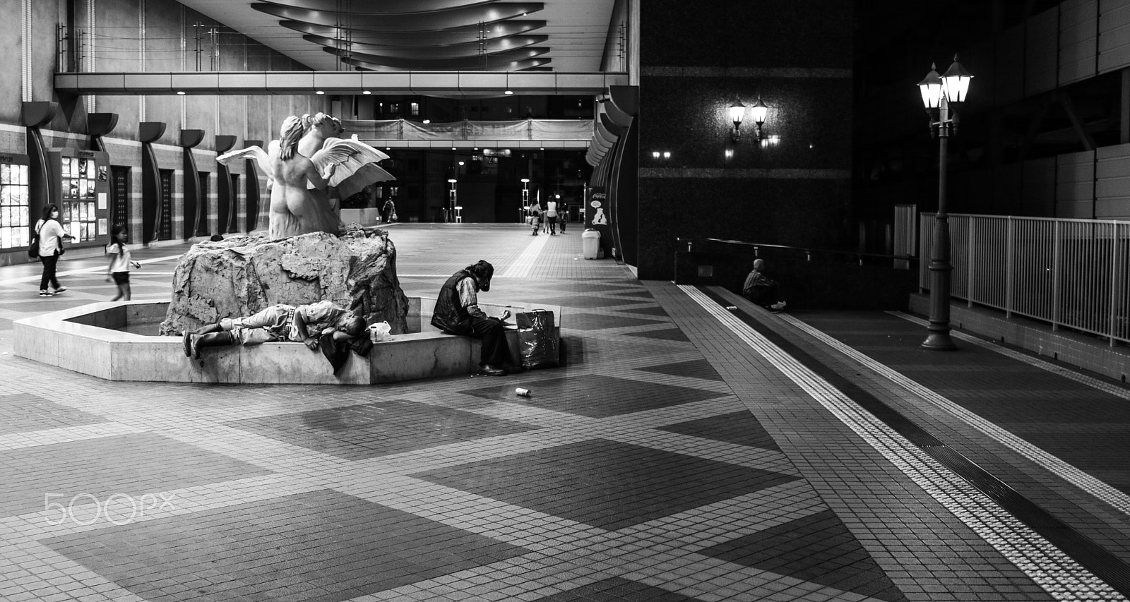 Canon EOS 760D (EOS Rebel T6s / EOS 8000D) sample photo. Bums in osaka photography