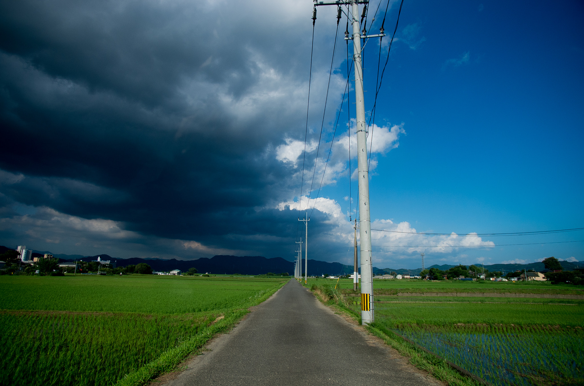 Pentax smc DA 14mm F2.8 ED (IF) sample photo. Cloud and road photography