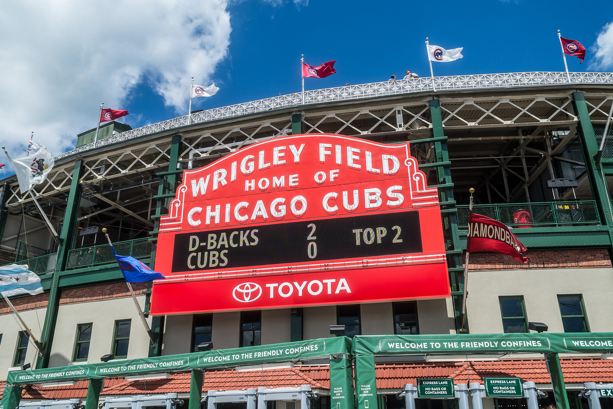 Nikon D610 + AF Nikkor 20mm f/2.8 sample photo. Wrigley field sign photography